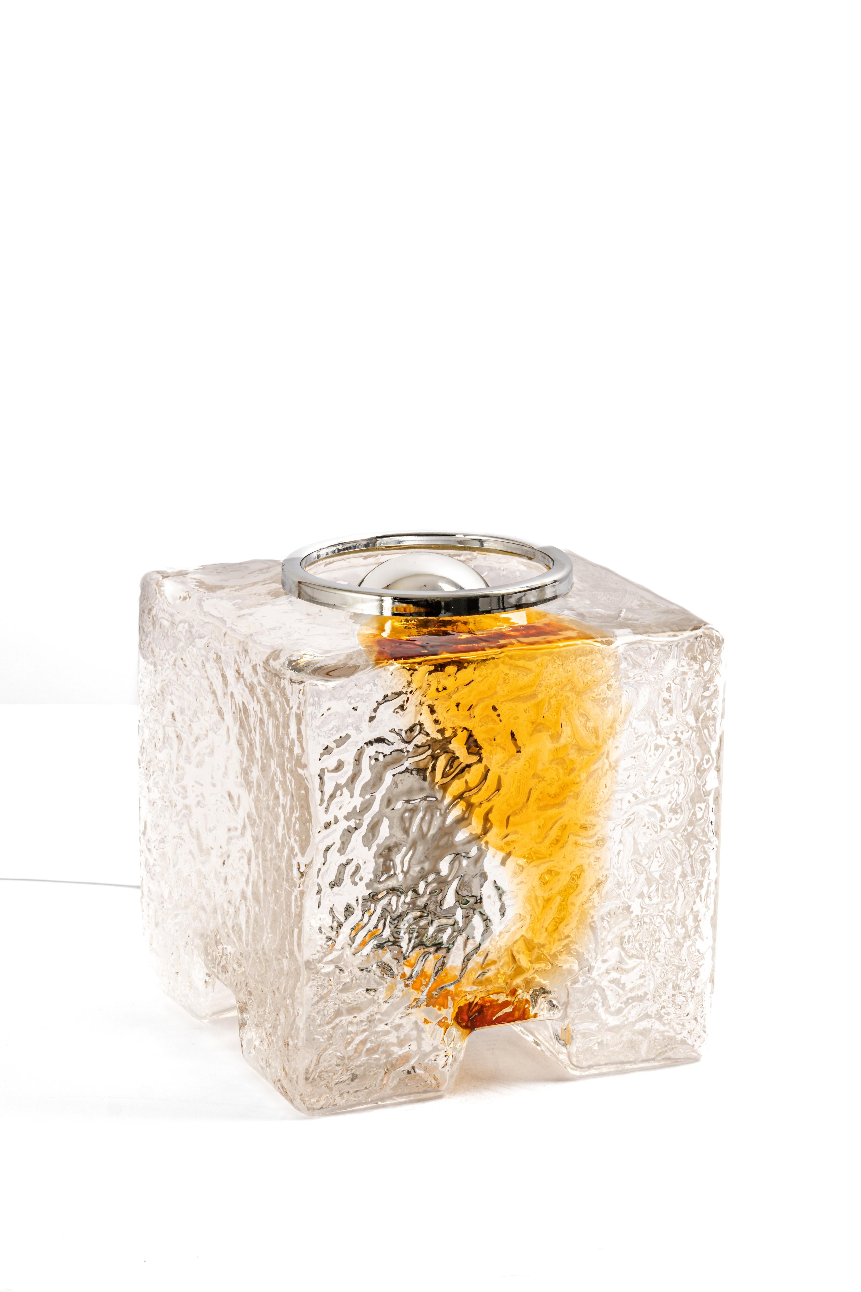 Wonderful large midcentury Cube table lamps by VeArt, Italy, 1970s.
Made of a single piece of blown and cased glass with yellow inclusions that have been applied in an abstract expressionist manner.
Manufacturer: VeArt

Stunning glass form and