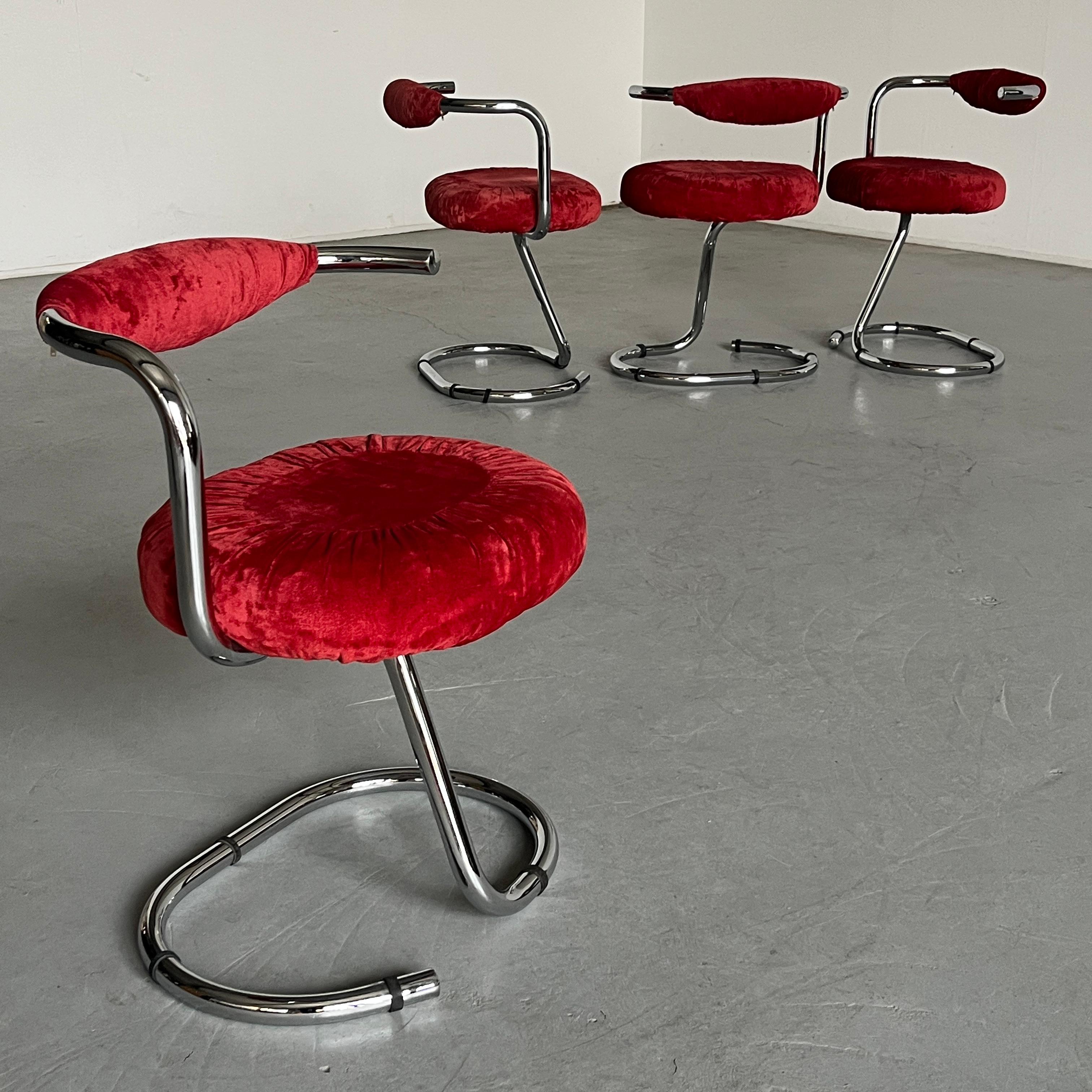 One of four famous 'Cobra' chairs designed by Giotto Stoppino, featuring a base made from a single piece of curved chrome tubular steel, with the original seat and backrest in red velvet upholstery.
Produced by Arrben, Italy. Labeled (engraving on