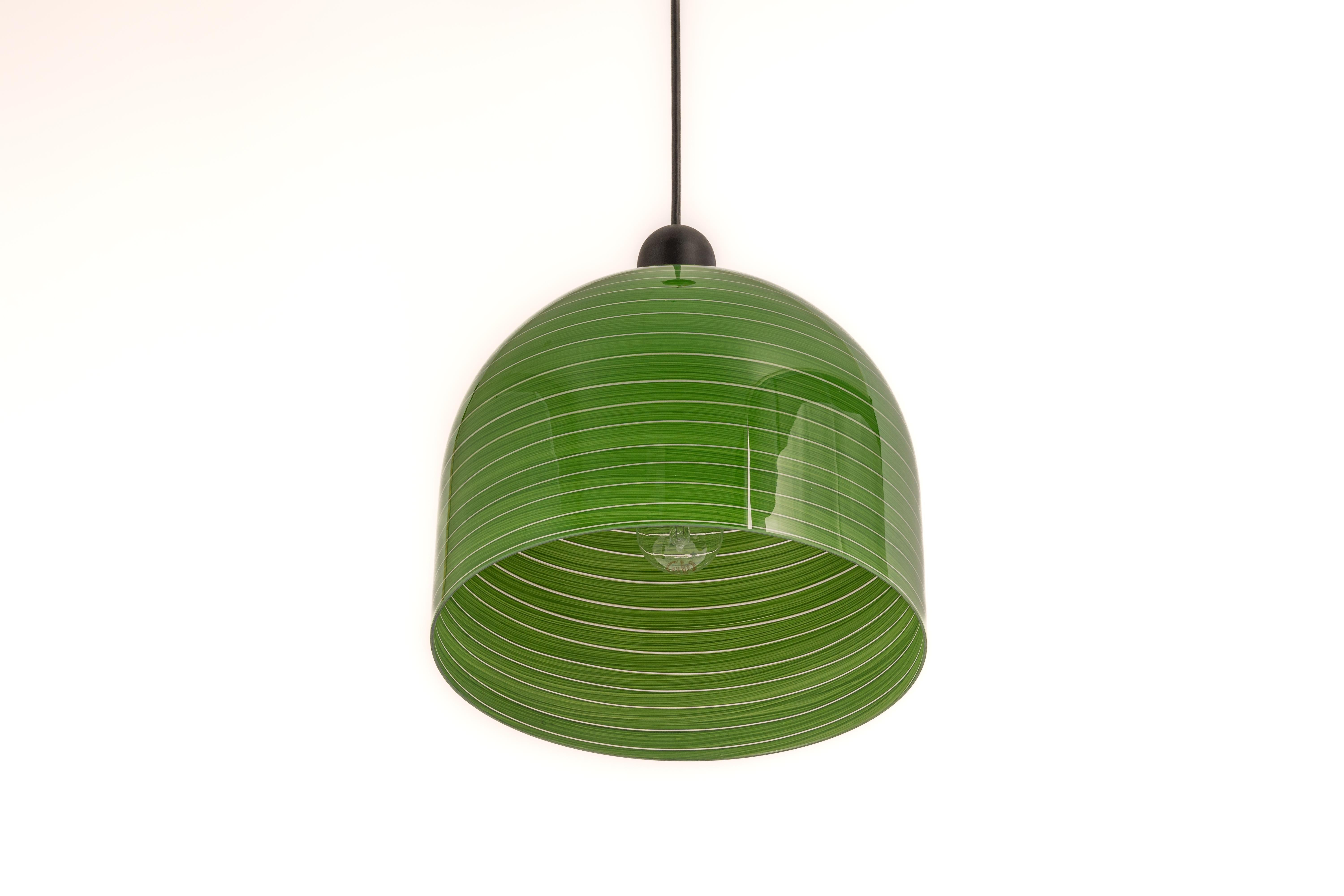 1 of 5 Green glass pendant light by Peill & Putzler, manufactured in Germany, circa the 1970s.
Wonderful light effect
High quality and in very good condition. Cleaned, well-wired, and ready to use. 
The fixture requires 1x E27 Standard bulbs with