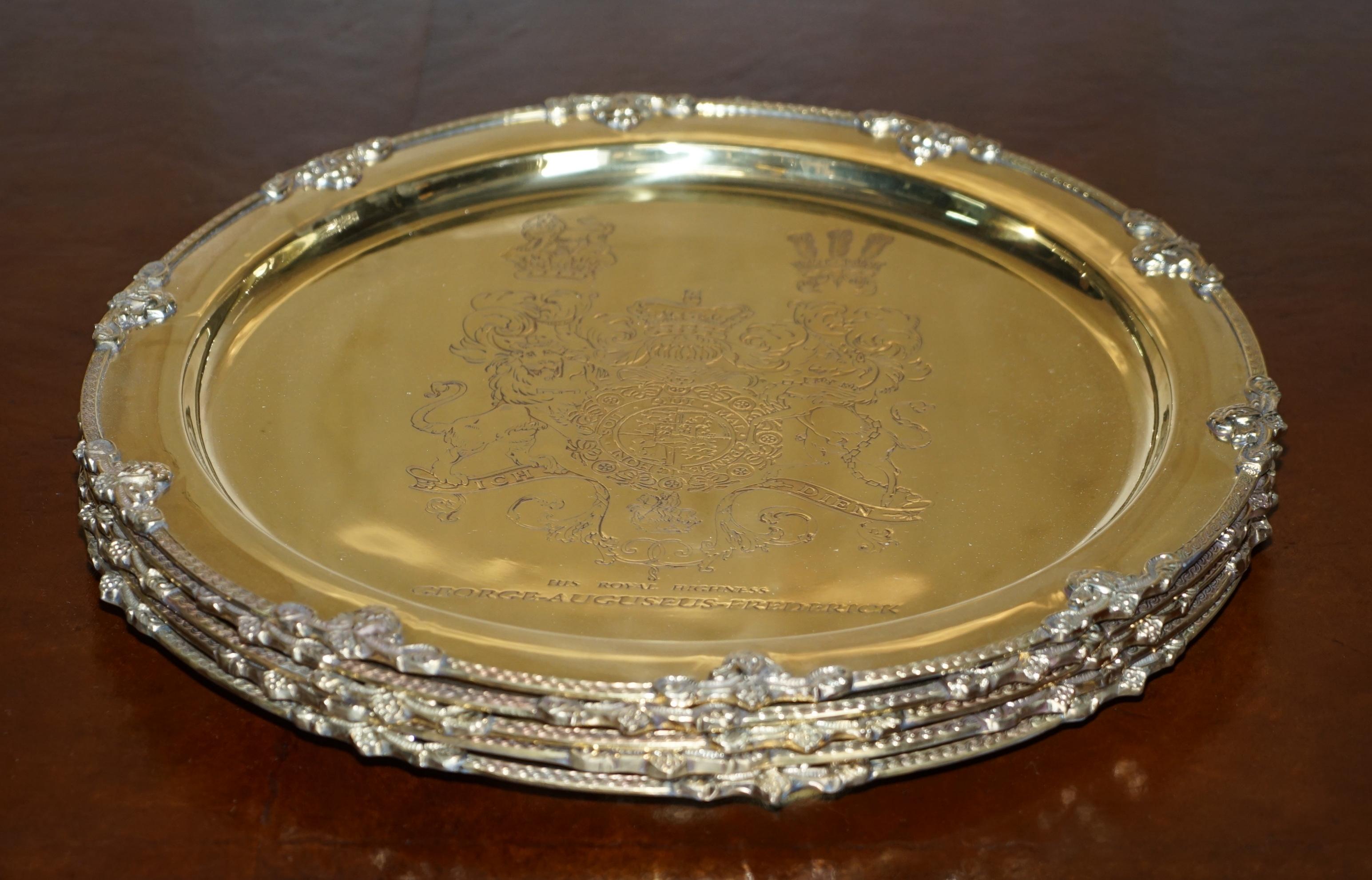 We are delighted to offer for sale 1 of 4 Gold gilt Sterling Silver plated, fully hallmarked for Sheffield 1919 Serving trays with engraved Armorial coat of arms crest for King George IV “His Royal Highness George Auguseue Frederick”

These are