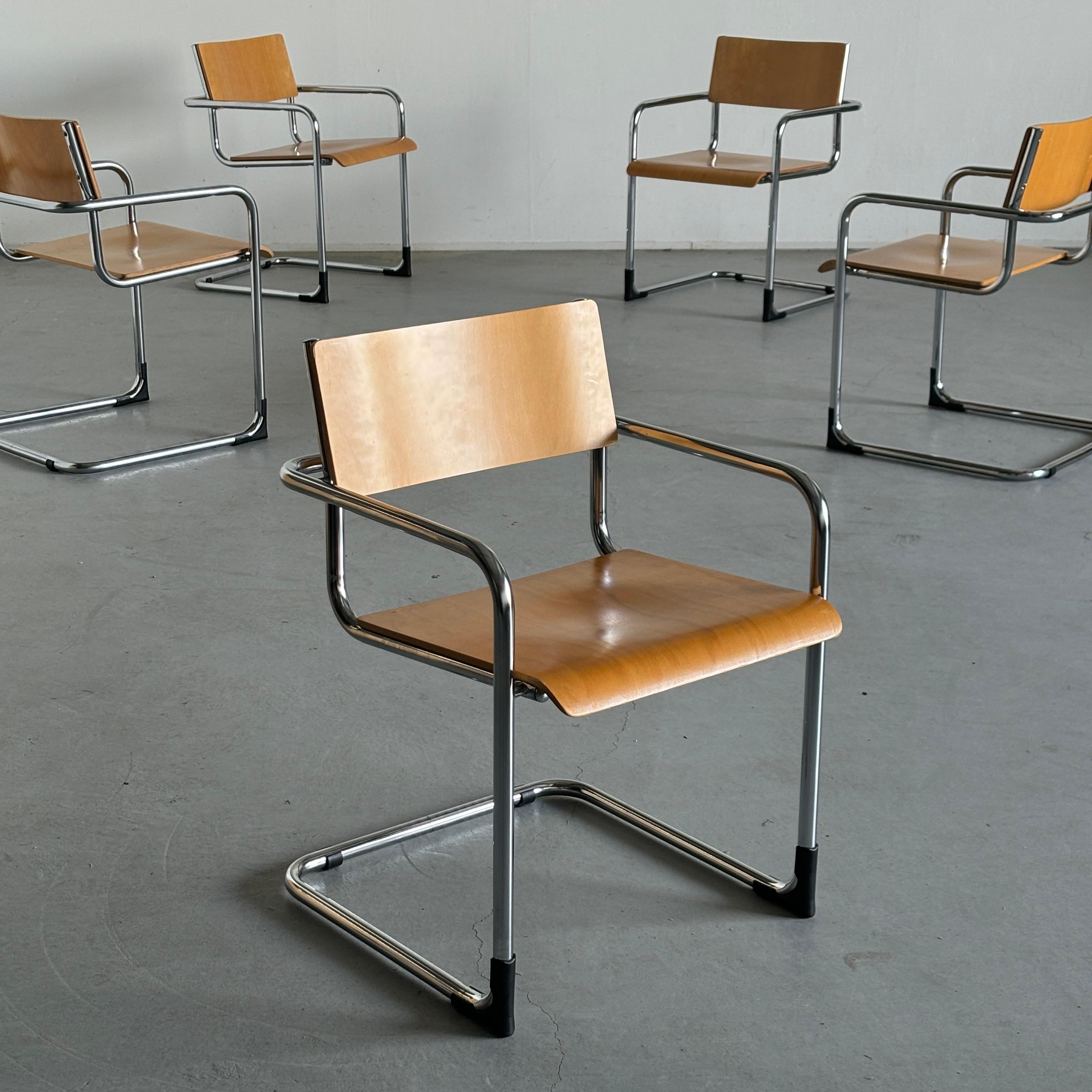 Italian Mid-Century-Modern armchairs in tubular steel chrome and bent plywood.
Based on the 1920s designs of Mart Stam and Marcel Breuer.
Produced by Plurima Italy in the 1970s.

Overall in excellent vintage condition, as can be seen from the