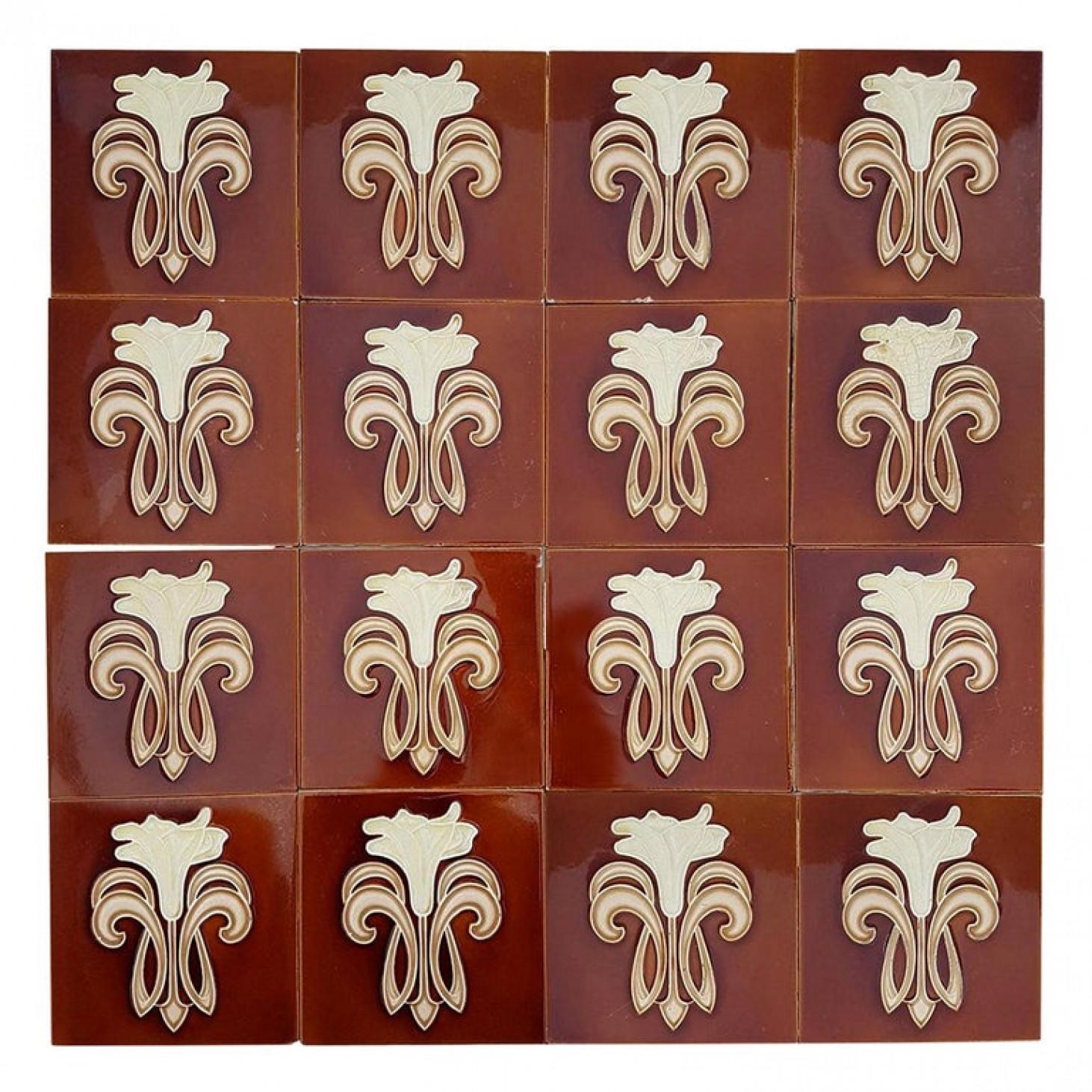 Recently lifted from its original home, a set of antique tiles from the early 20th century. With a beautiful stylized design of a lily.
Manufactured by Gilliot Fabrieken te Hemiksem.

Size each tile: Inches 5.9 inches (15.1 cm) width x 5.9 inches