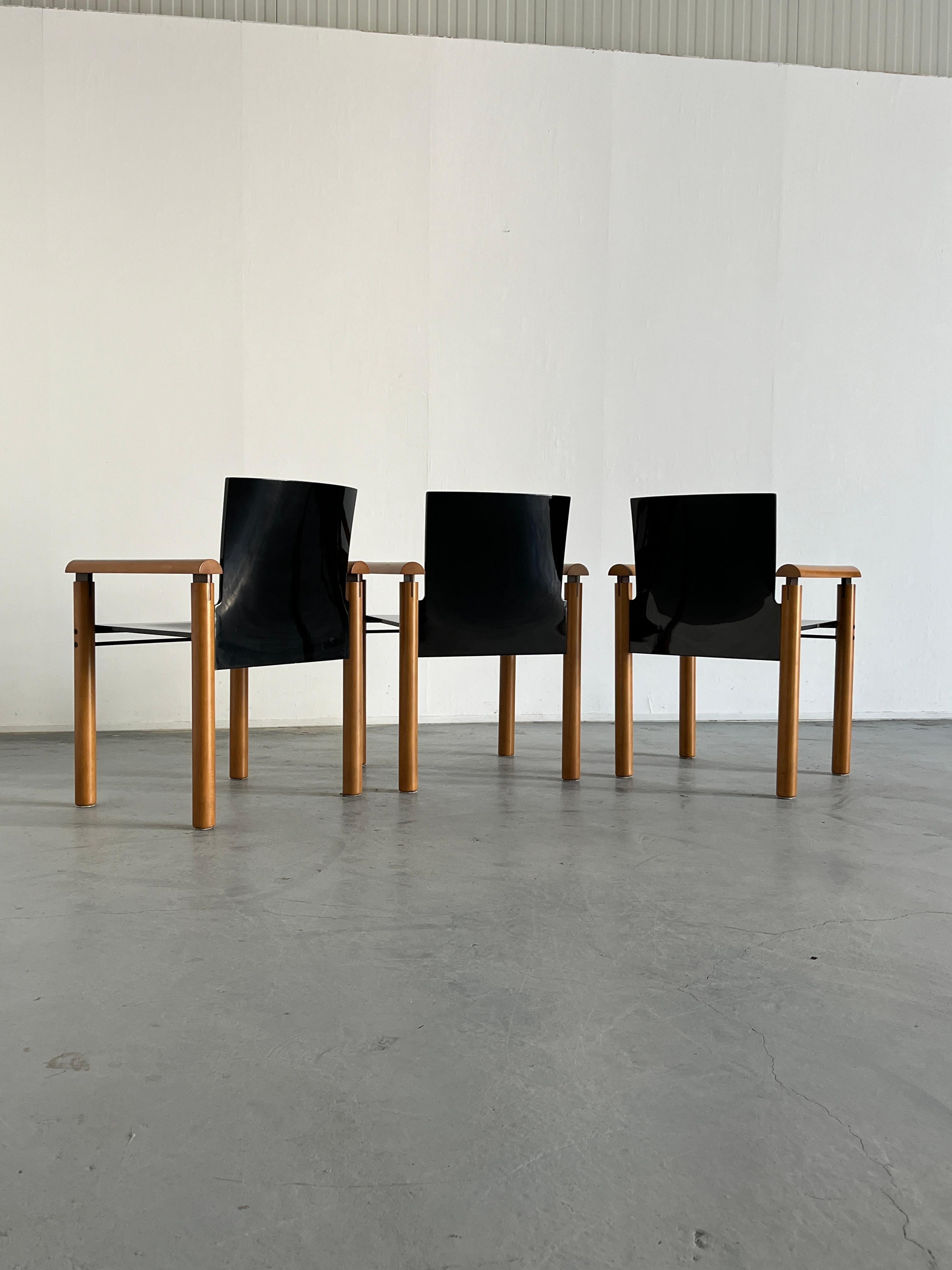 Metal 1 of 6 Elegant Modernist Armchairs in Dark Gloss Finish, Attributed to Artelano For Sale