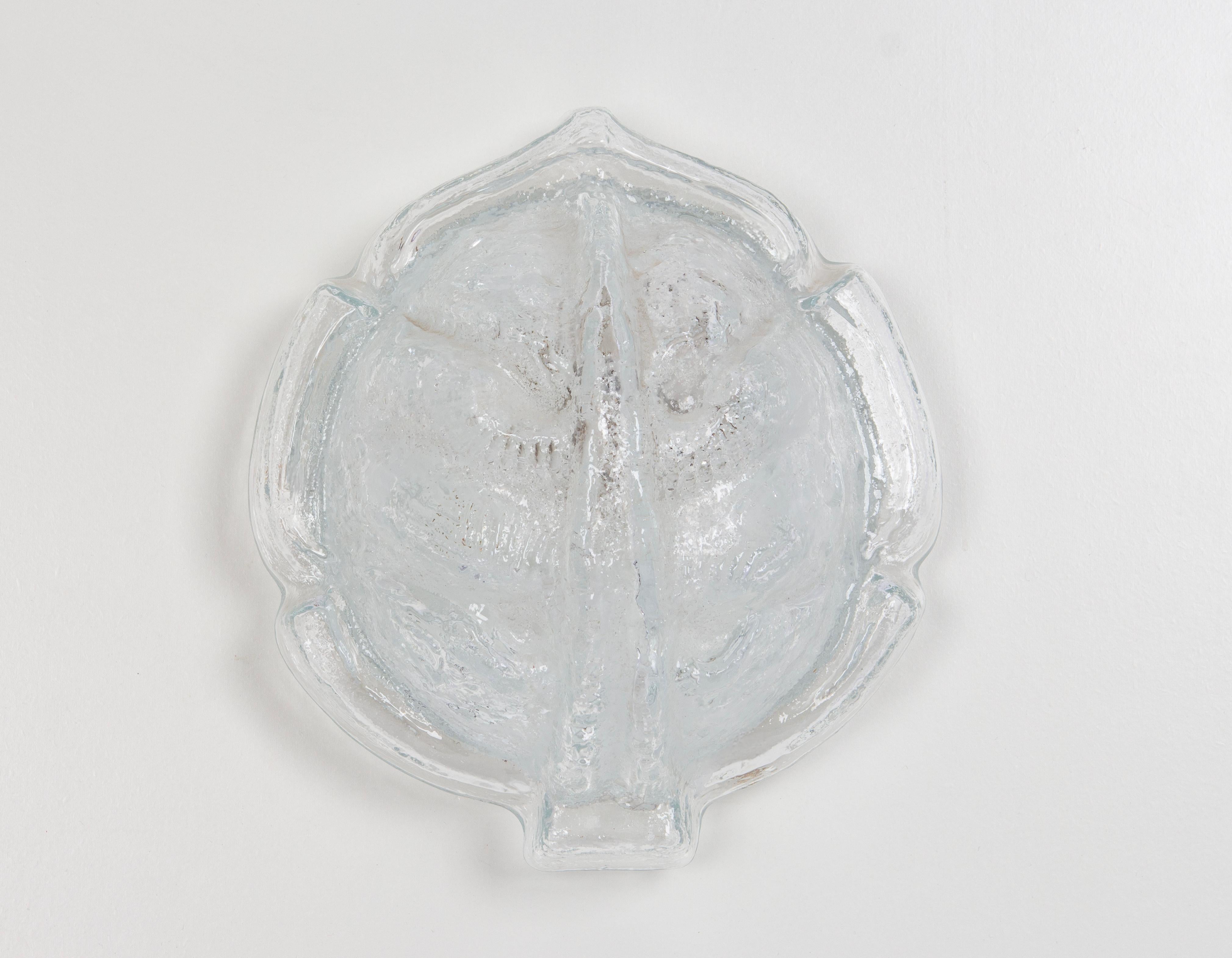 Pair of Beautiful wall lights with a Ice glass in shell form made by Glashütte Limburg, Germany. Manufactured in midcentury, circa 1970.
Thick ice glass on a white color frame

High quality and in very good condition. Cleaned, well-wired and ready