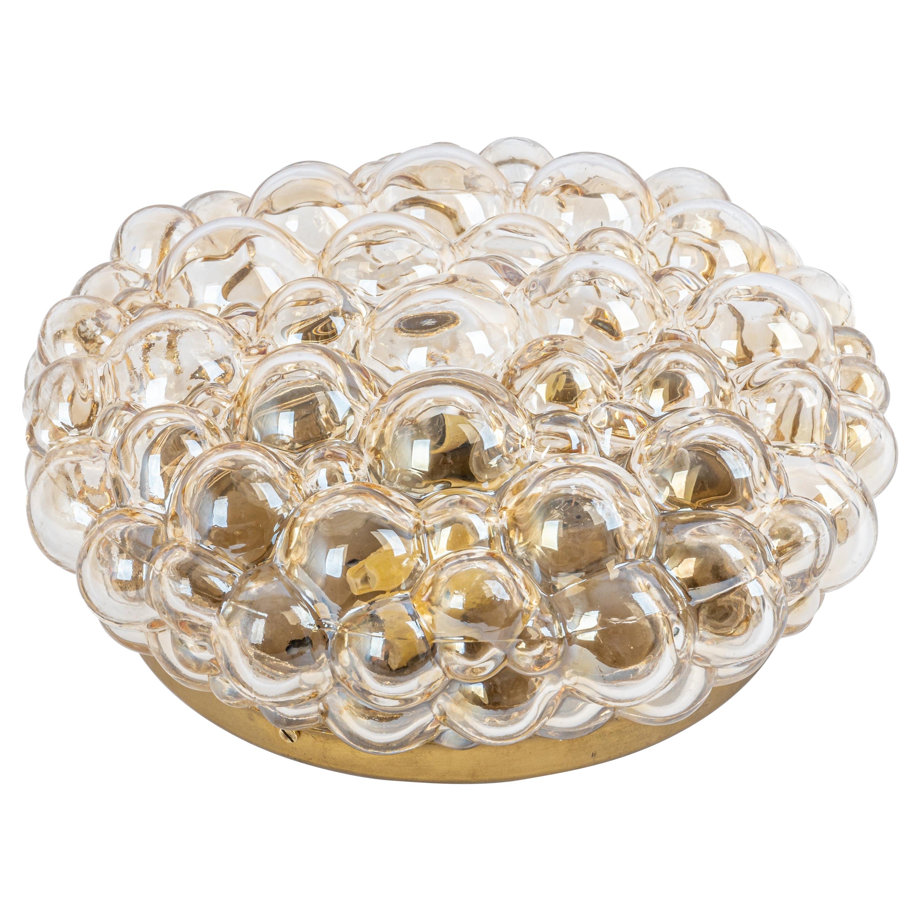 Aplique grande de cristal burbuja ámbar de estilo de Helena Tynell, Alemania.
Alta calidad y en muy buen estado. Limpio, bien cableado y listo para usar. 

Cada Lámpara requiere 2 x E14  bombillas pequeñas de 60W máx. cada una 
Las bombillas no