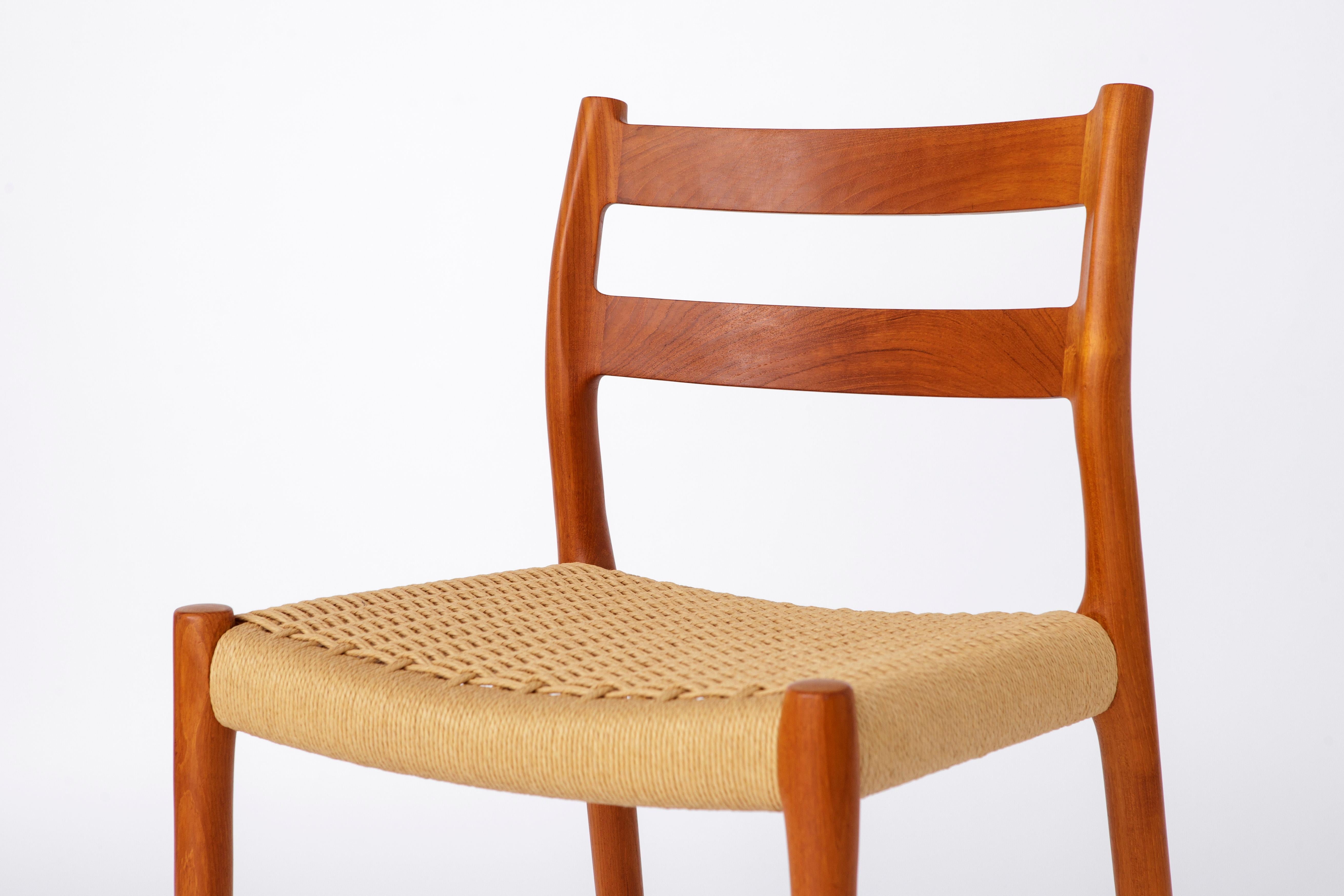 Vintage Chair by Niels Otto Moller. 
Model: 84 from 1976. 
Displayed price is for 1 chair. Totally up to 6 available. 

Massive, sturdy teak wood frame. Refurbished and oiled. 
Renewed Danish paper cord seat weaving on all chairs. 
Manufacturer's