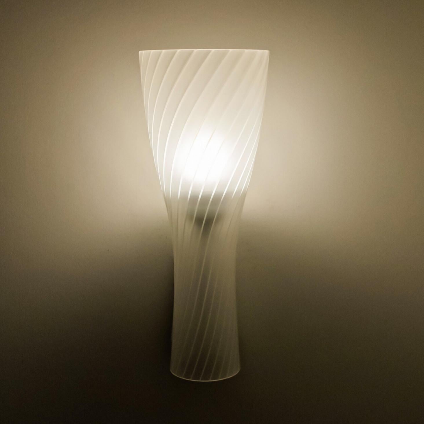 Six beautiful mid-20th century wall lights by Gangkofner, made for Peill. Made around 1970 in Germany, Europe. Featuring a large clear white glass shade with stripes along the length of it. The light illuminates wonderful.

Dimensions:
Height: