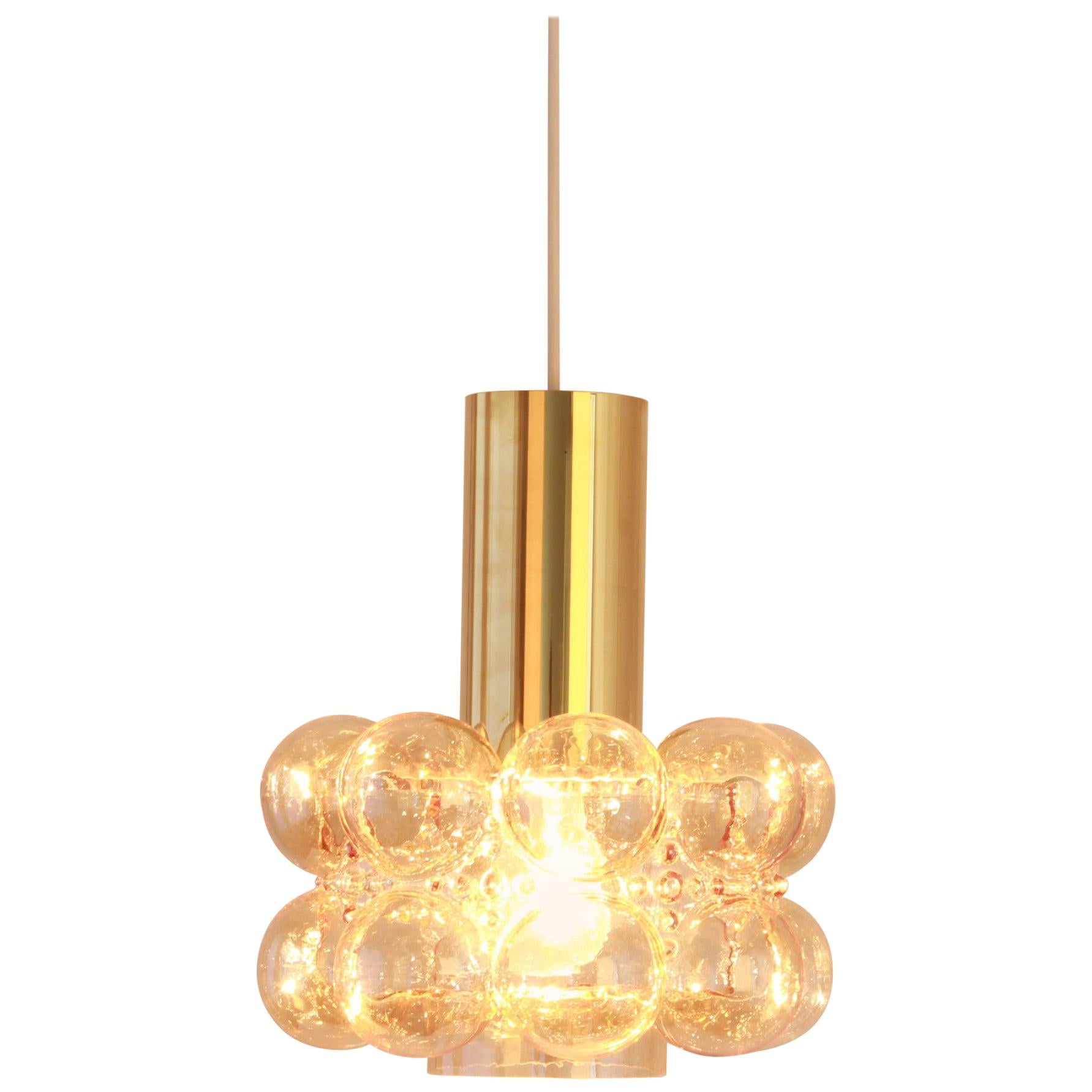 A round smoke tone bubble glass pendant designed by Helena Tynell for Limburg, manufactured in Germany, circa 1970s.

Sockets: Needs 1 x E27 standard bulb with 100W max each and compatible with the US/UK/ etc. standards
Drop rod can be adjusted