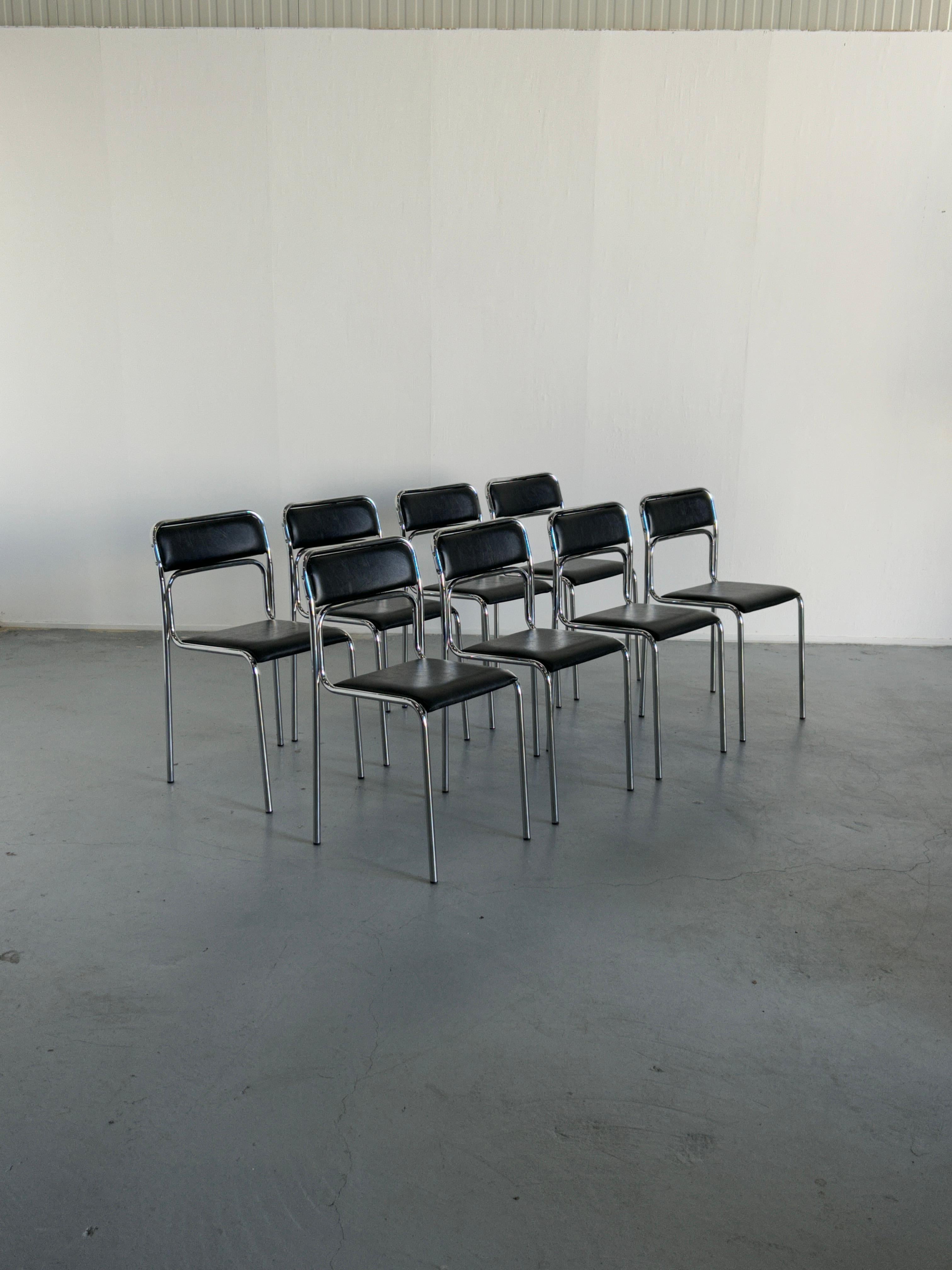 1 of 8 Italian modernist, Bauhaus design tubular chrome and black faux leather stackable dining or living room chairs.
Italian production, early 1980s.

In good vintage condition with expected signs of age and small patina on the frames, as