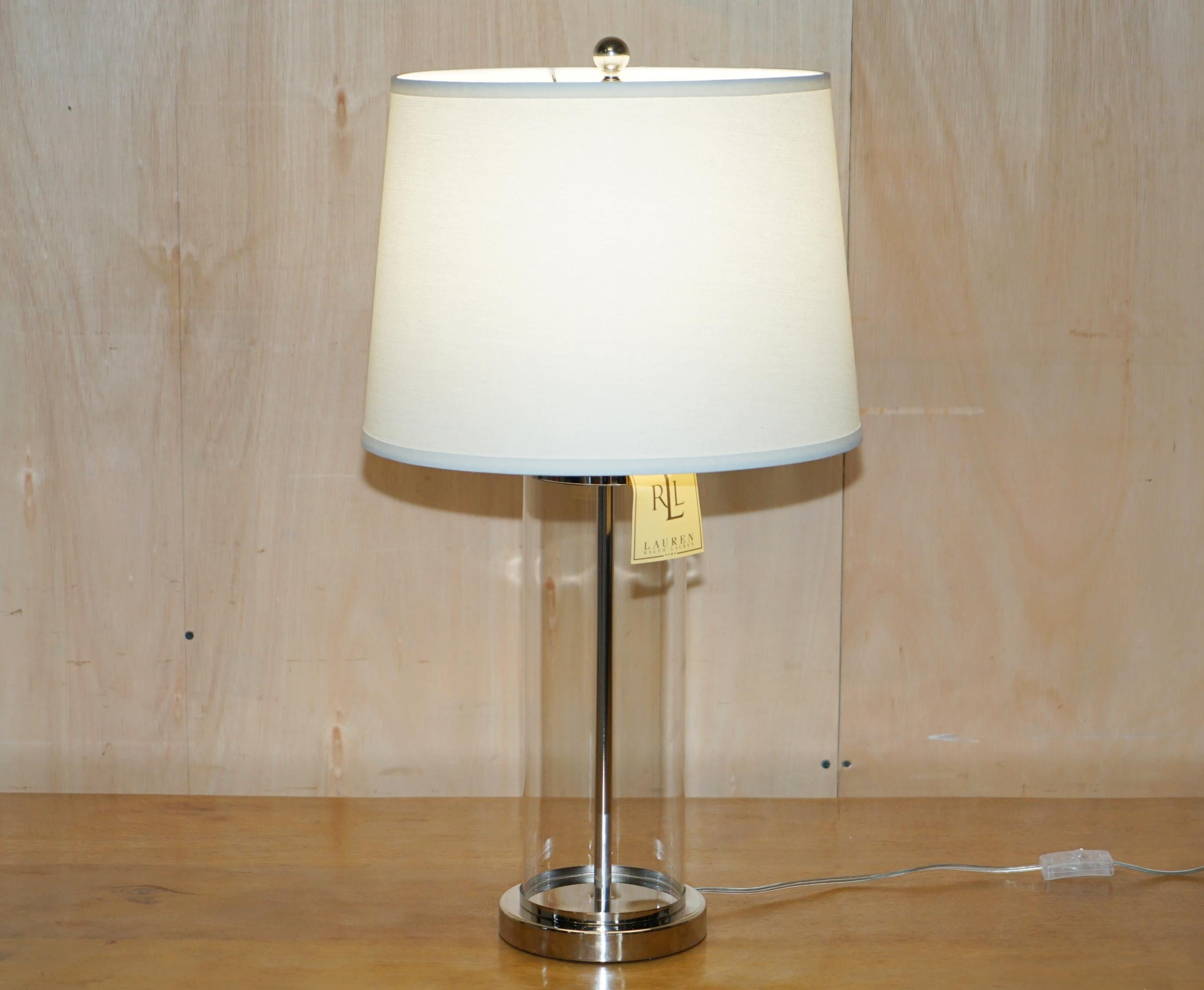 Royal House Antiques

Royal House Antiques is delighted to offer for sale 1 of 2 brand new in the original box Ralph Lauren storm lantern glass cylinder table lamps

This lamp is part of a massive suite of Ralph Lauren lamps we bought for a show