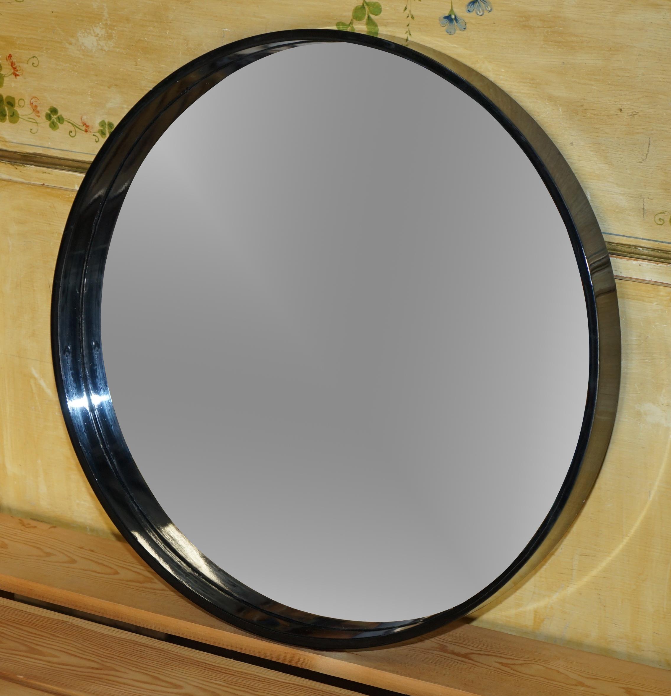 We are delighted to offer for sale 1 of 7 round wall mirrors with deep ebonised frames

This sale is for 1 mirror with the option to buy up to 8 in total

They are good looking and decorative pieces, the frames may have some light patina marks but