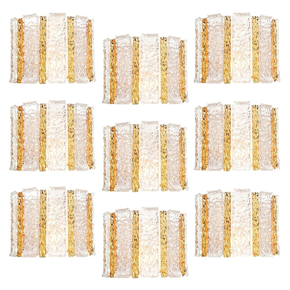 1 de 10 apliques de tambor de forma semicircular chapados en oro con cinco paneles de cristal esmerilado sobre un marco de latón dorado con motivos de inspiración Brutalista. De los años 60 por Kalmar, Austria.


Gran calidad y en perfecto