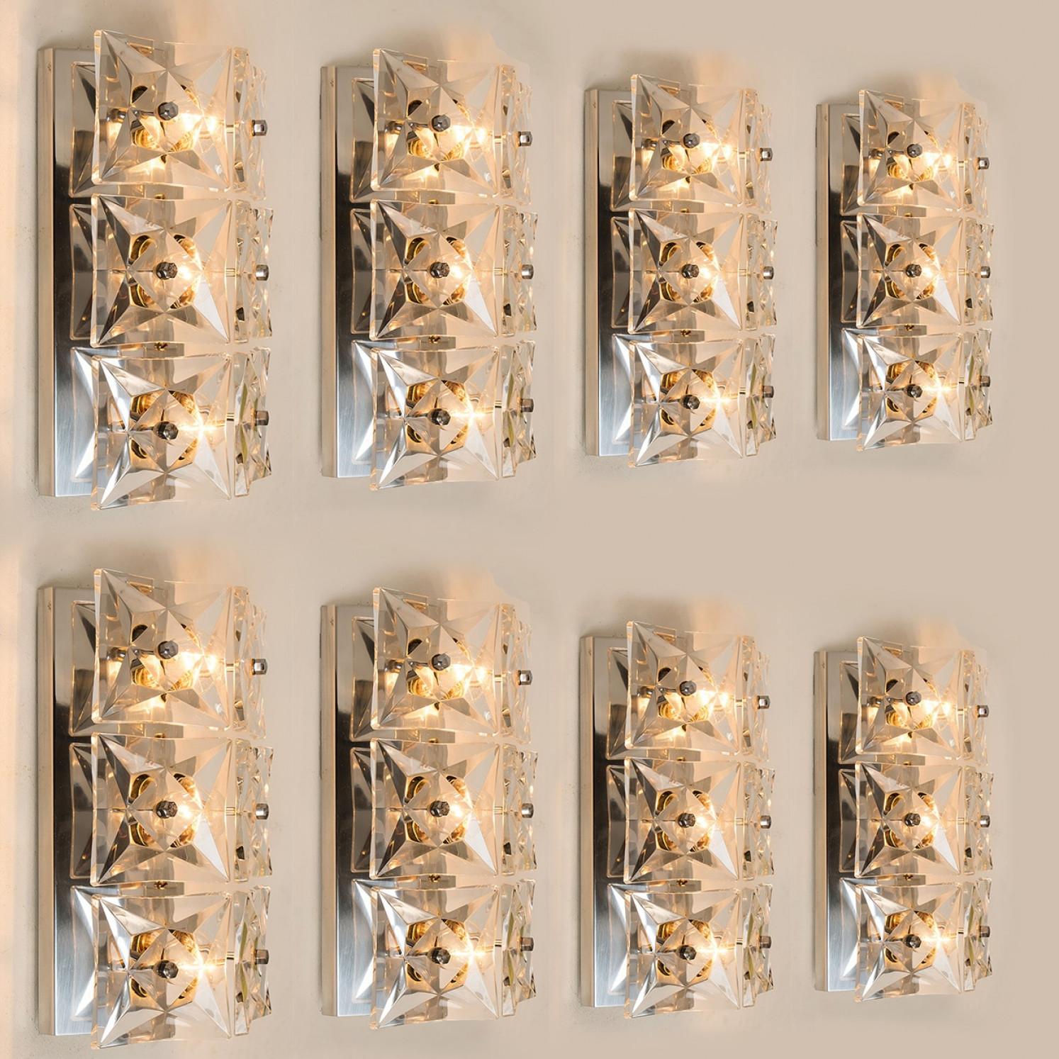 A pair of wall light fixtures by Kinkeldey, Germany, manufactured in the midcentury, circa 1970 (late 1960s or early 1970s). Really heavy quality. They are comfortable with all decor periods. This wall lights are executed to a very high standard.