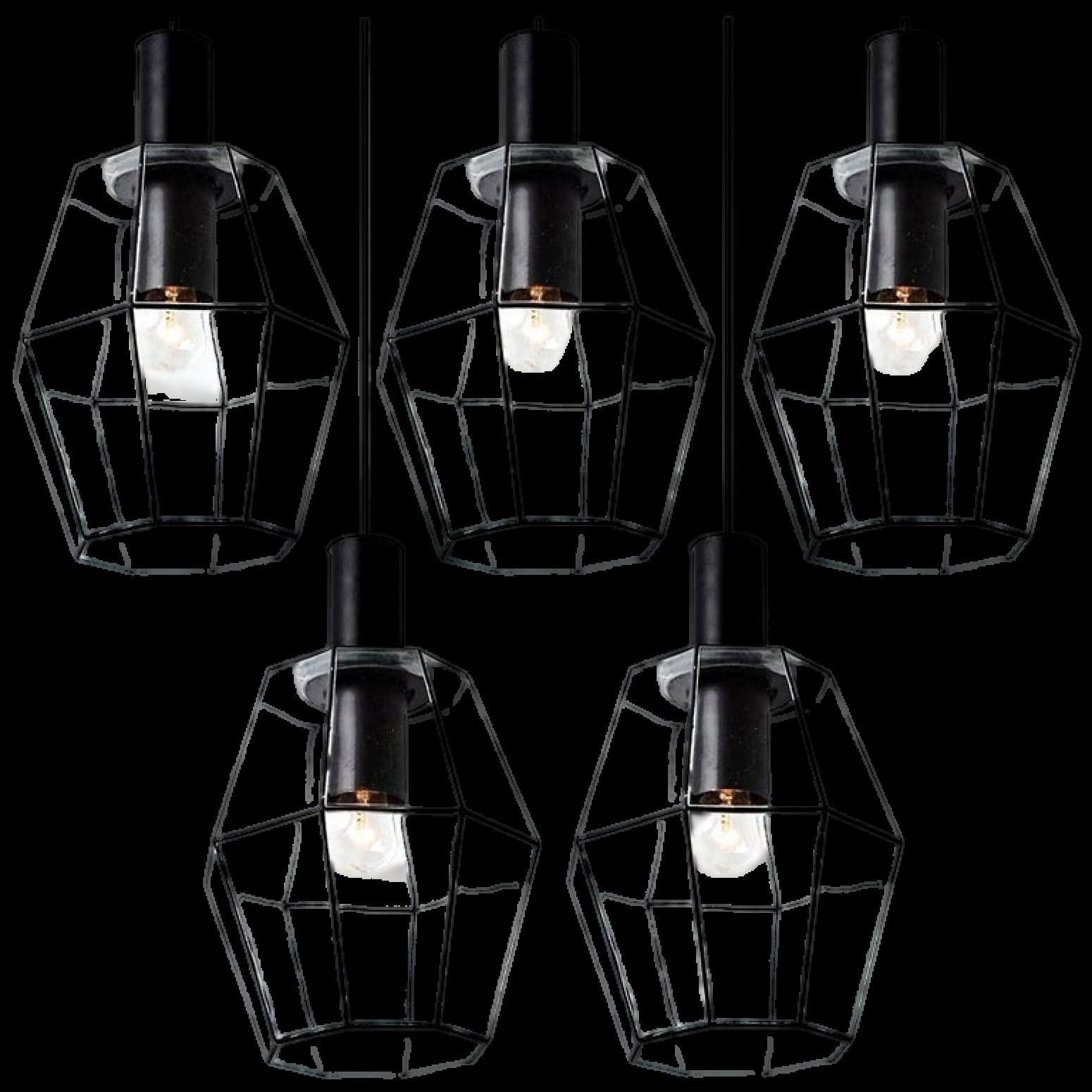 This set 12 of octagonal glass light fixtures were manufactured by Glashütte Limburg in Germany during the 1960s. Beautiful craftsmanship. Each lamp, made from elaborate clear glass with rectangular black accent elements.

Illuminates beautifully.