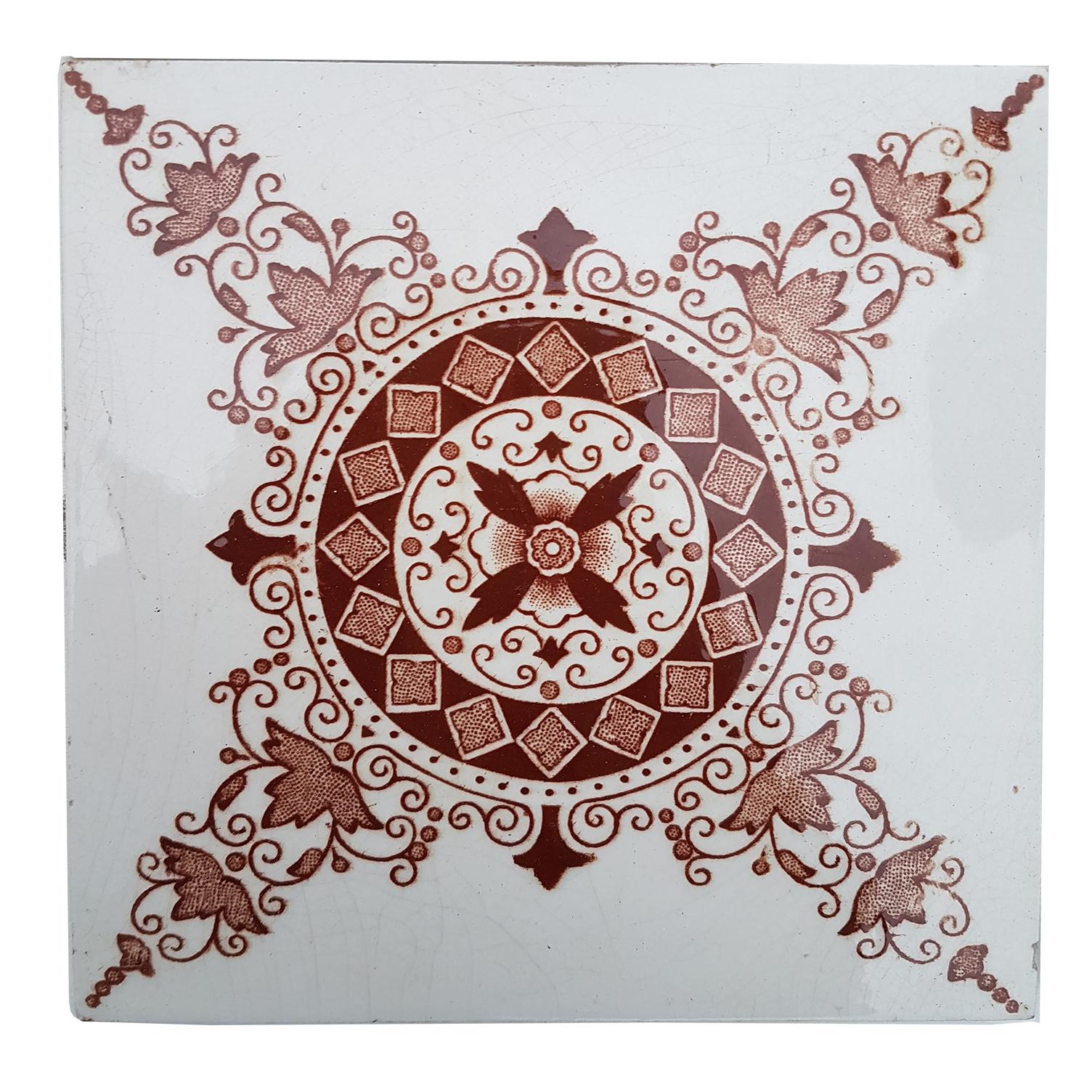 Recently lifted from its original home, a set of antique tiles from the early 20th century. With a beautiful geometric stylized design.
Manufactured by Produits Refractaires et Ceramiques Morialme (SM)

Size each tile: inches 6 inches (15.2 cm)