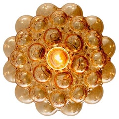 1 of the 2 Amber Bubble Glass Pendant Lamps by Helena Tynell, 1960