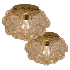 1 of the 2 Amber Bubble Glass Pendant Lamps by Helena Tynell, 1960