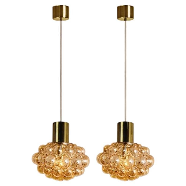 1 of the 2 Bubbled Glass and Brass Pendants by Helena Tynell, Germany 1970