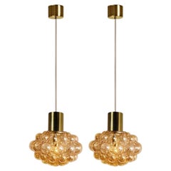 1 of the 2 Bubbled Glass and Brass Pendants by Helena Tynell, Germany 1970