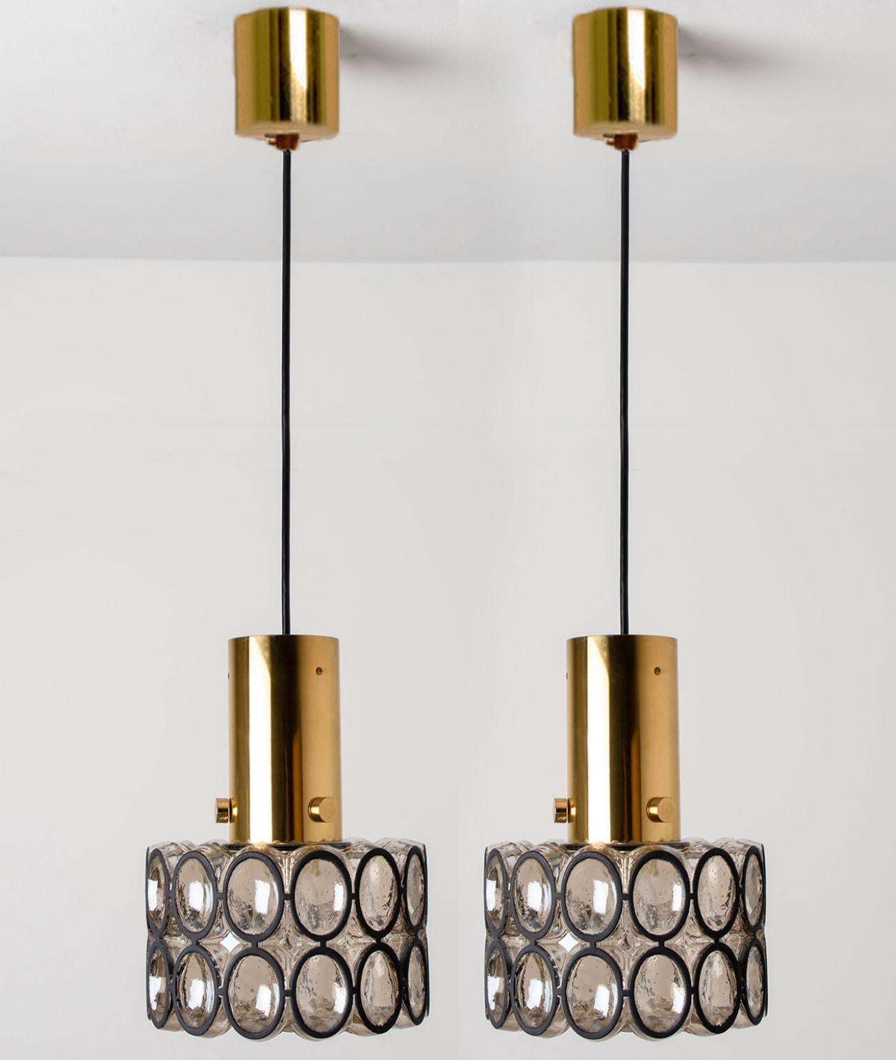 Mid-20th Century 1 of the 2 Circle Iron and Bubble Glass Chandeliers by Limburg, 1960s For Sale