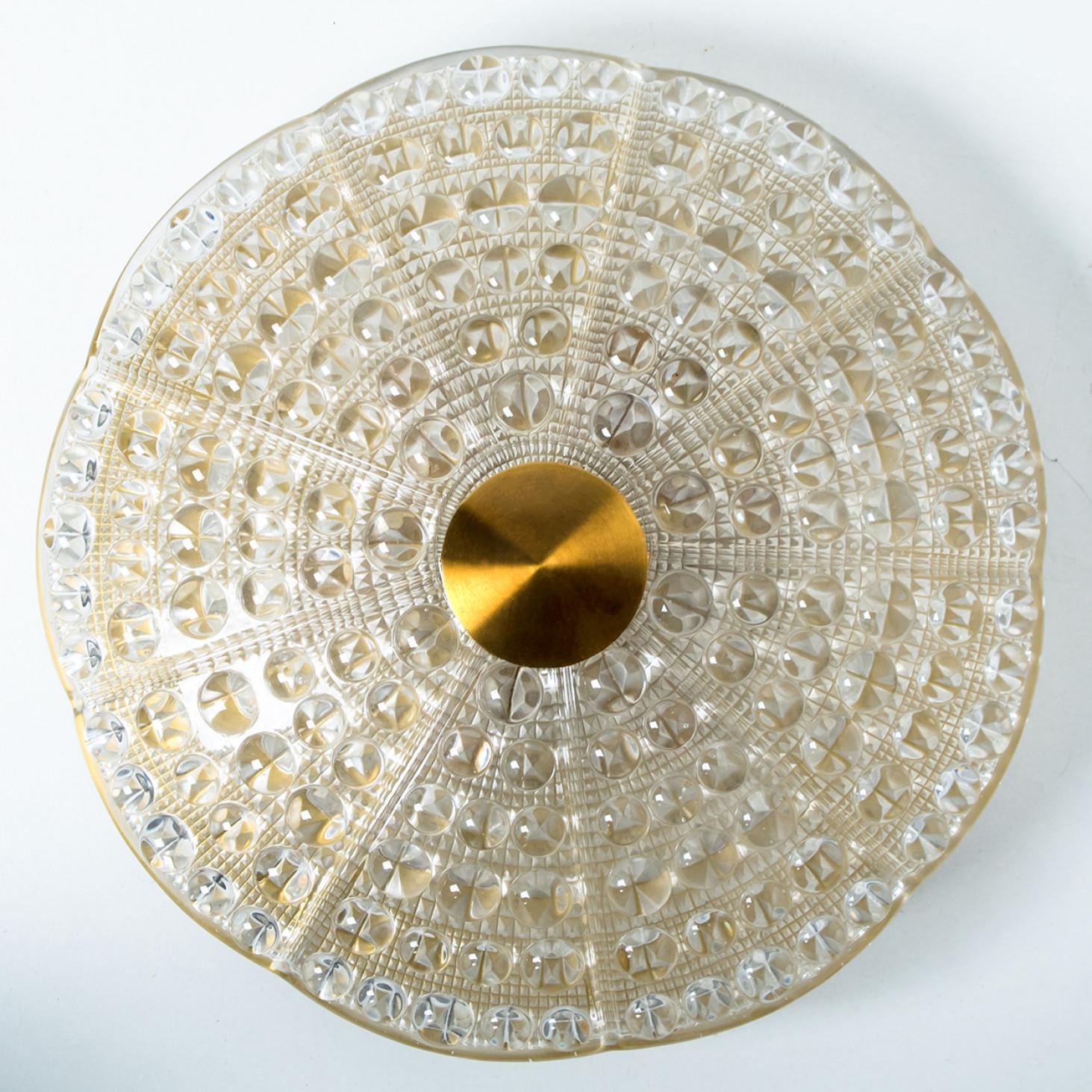 1 of the 2 Clear Gold Brass Glass Flush Mount wall lights, Fagerlund, 1960s In Good Condition For Sale In Rijssen, NL