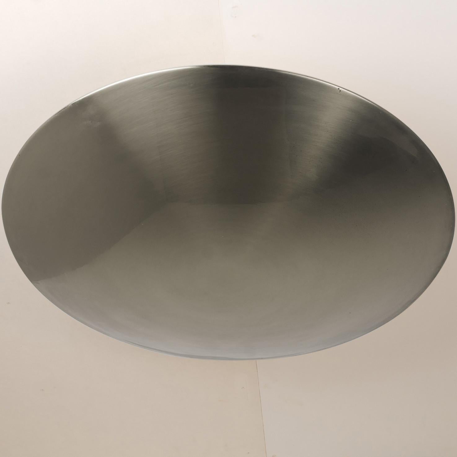 1 of the 2 high quality nickel flush mount ceiling lights or wall lights by Florian Schulz. A Nickel plated brass plate with five bulb setup around that stem, the flush mounts can also be used as wall lights.

The stylish and clean elegance of this
