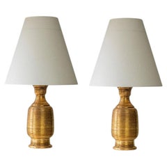 1 delle 2 lampade curve in ceramica smaltata oro, paralume personalizzato di R. Houben