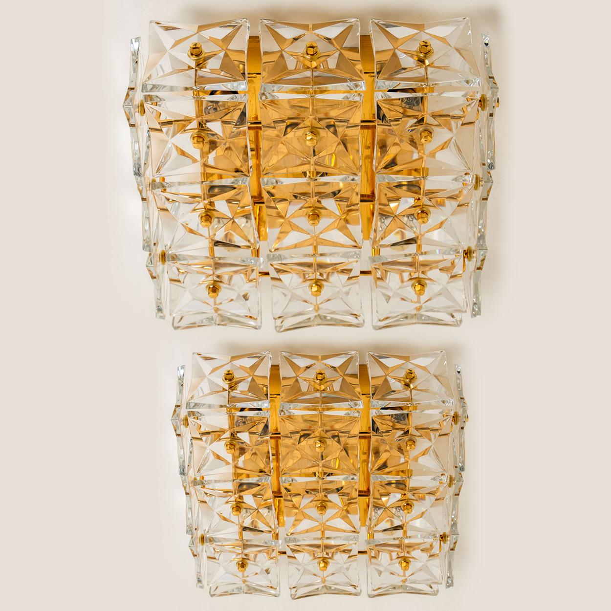 This modernist design flushmount was designed by the Kinkeldey design team during the 1970s, and manufactured in Germany. A handmade and high quality piece.

The crystals are meticulously cut in such a way that they radiate the light of the bulbs