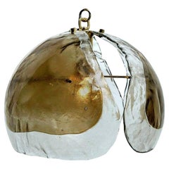 1 of the 2 Kalmar Chandelier Pendant Lights, Amber Glass and Brass, 1970s