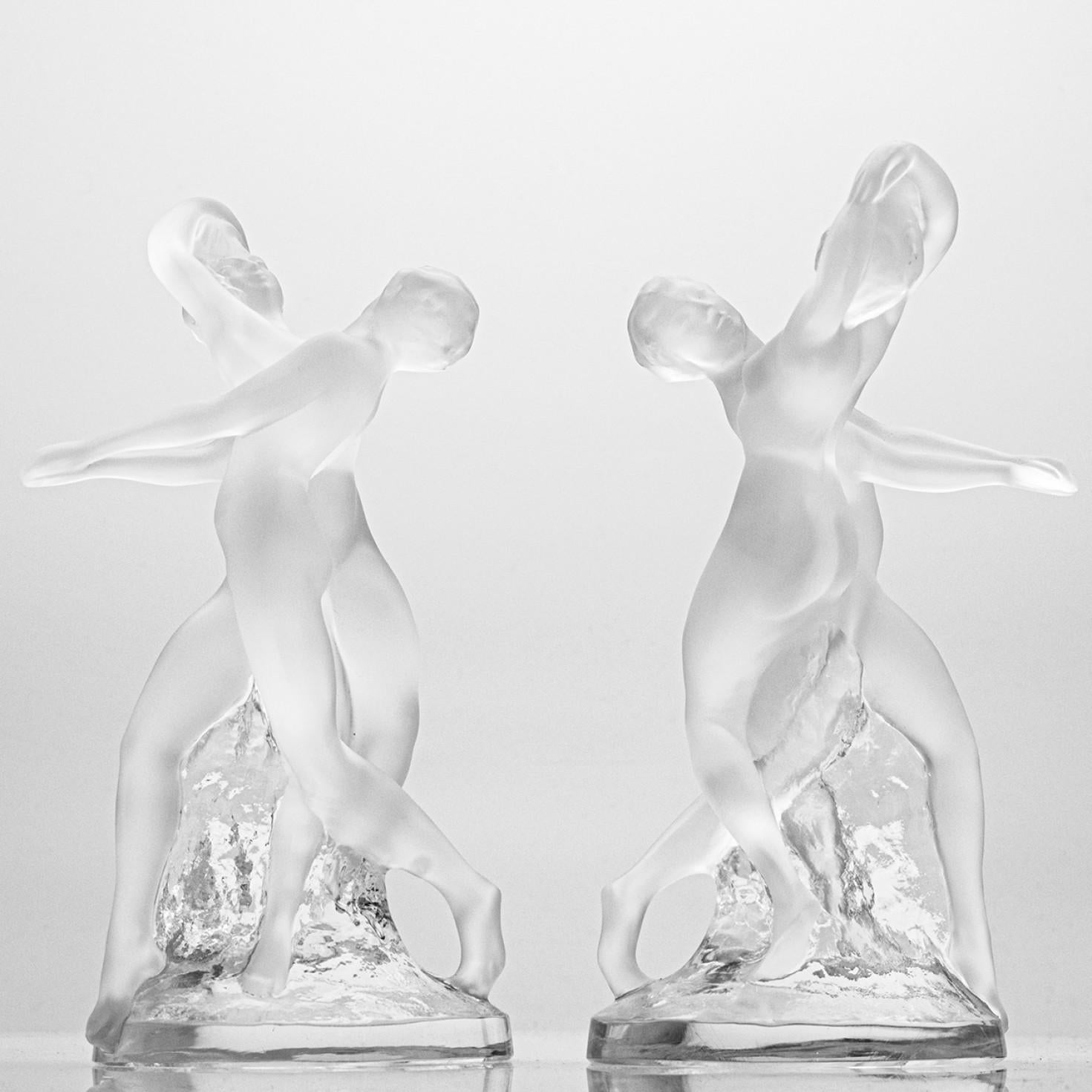 Luxury at its finest,  A collector’s item made by Lalique in France. These two high-end pieces are made by Lalique.

The Lalique Deux Danseuses Figurine is a radiant crystal sculpture of two nude dancers.

Please notice the price is for one piece,