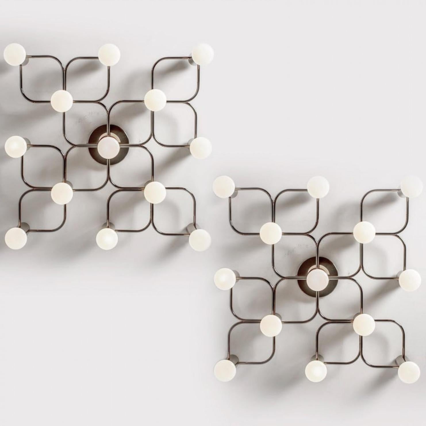 Gorgeous Sciolari style ceiling or wall flush mount by Leola. Made with solid chrome, Germany, 1970s.

Can be used as ceiling flush mount or as an extra ordinary wall light. 2 pieces available.

The light fixture requires 9 E14 candelabra bulbs,