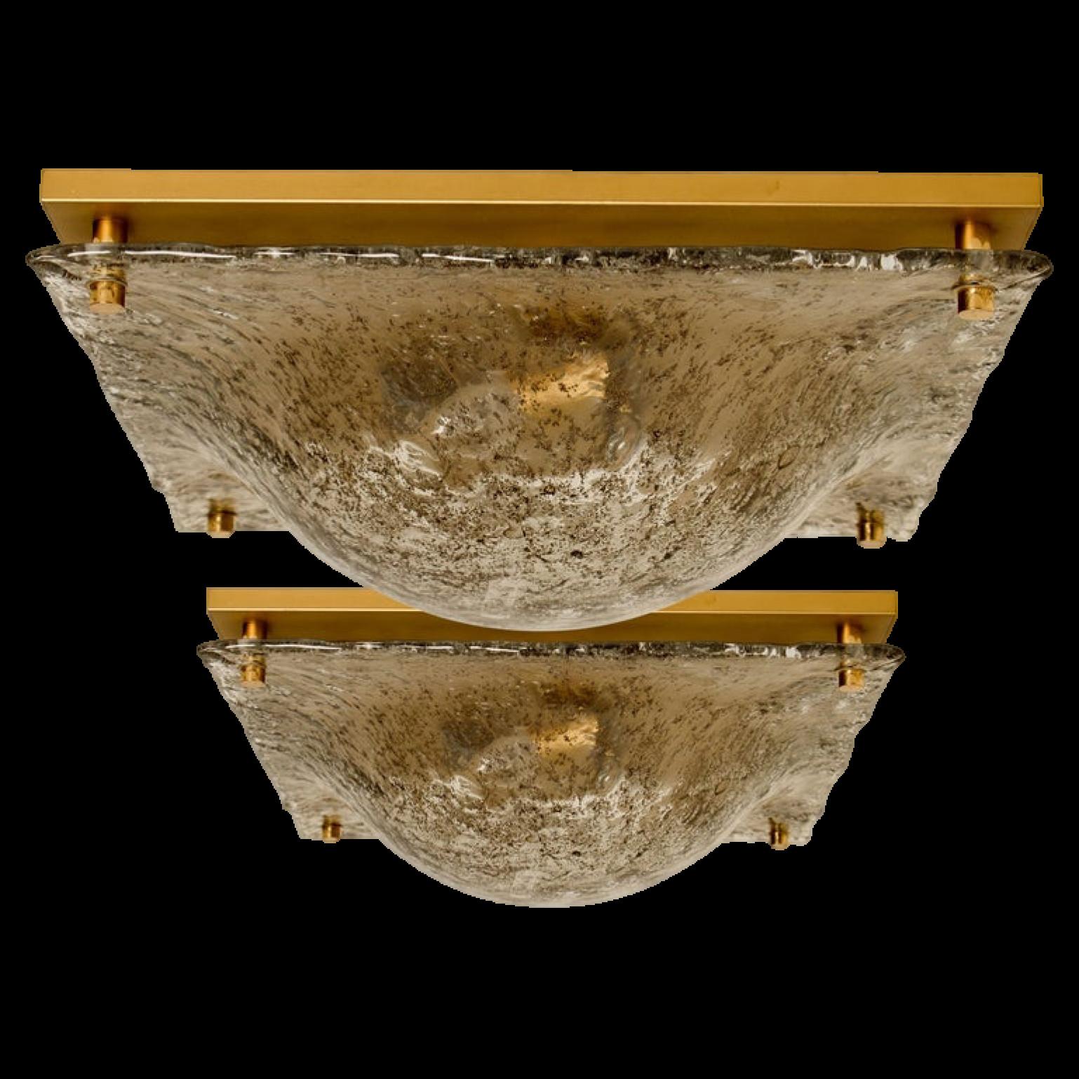 A high quality modern thick textured ice glass flushmount light by Kalmar, circa 1965. The flushmount is featuring a huge quare brown marbled blown ice glass dish. The handmade dish gives the piece a heavy ice appearance which refracts the light,