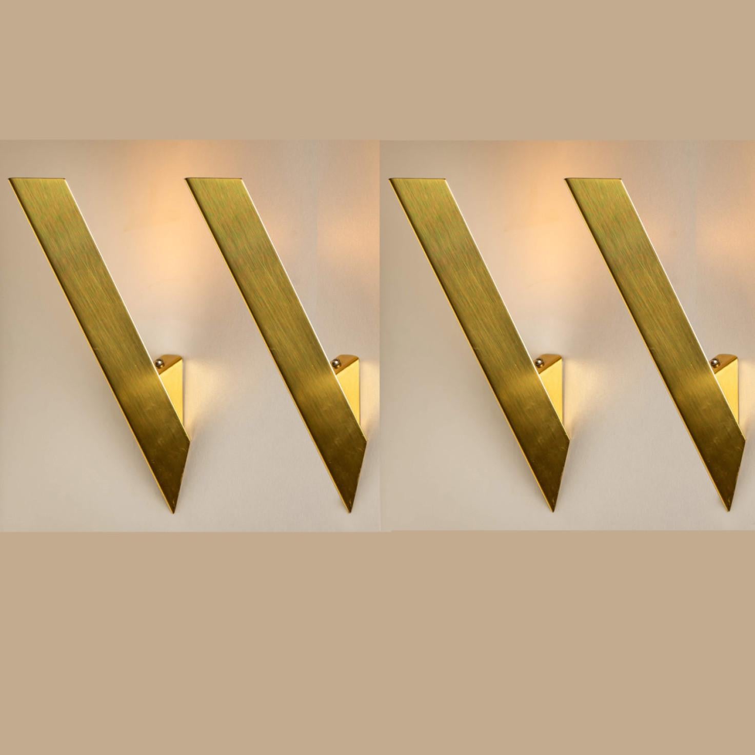 Beautiful wedge-shaped high end wall lights by J.T. Kalmar, 1970s, Austria.
Quality brass frame in an elegant warm gold color,

The light will bring a touch of intimacy. Suitable for a staircase, kitchen, hall or bedroom.

Heavy quality, in good