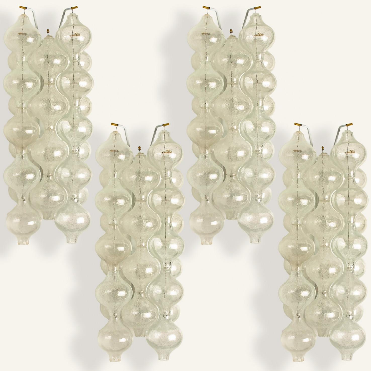 1 of the 2 pairs unique large and elegant 'Tulipan' glass wall sconces by J.T. Kalmar, Austria, Vienna, manufactured in midcentury, circa 1970 (late 1960s or-early 1970s). Tulip shaped hand blown bubble glasses. With a white enameled metal frame