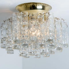 1 of the 2 Round Textured Clear Glass Gold Flush Mount, 1960s, Doria Leuchten