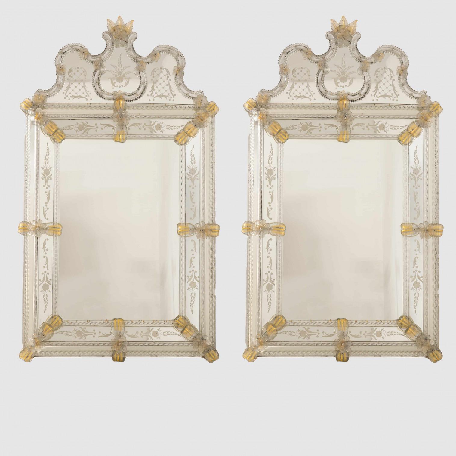 Classic Venetian Archtop Mirror With Murano Glass from the well know designer Fratelli Barbini. A stunning 17th century-inspired archtop mirror. The top is crowned with an ornate, giving it a grand and traditional look. Golden Murano glass flowers