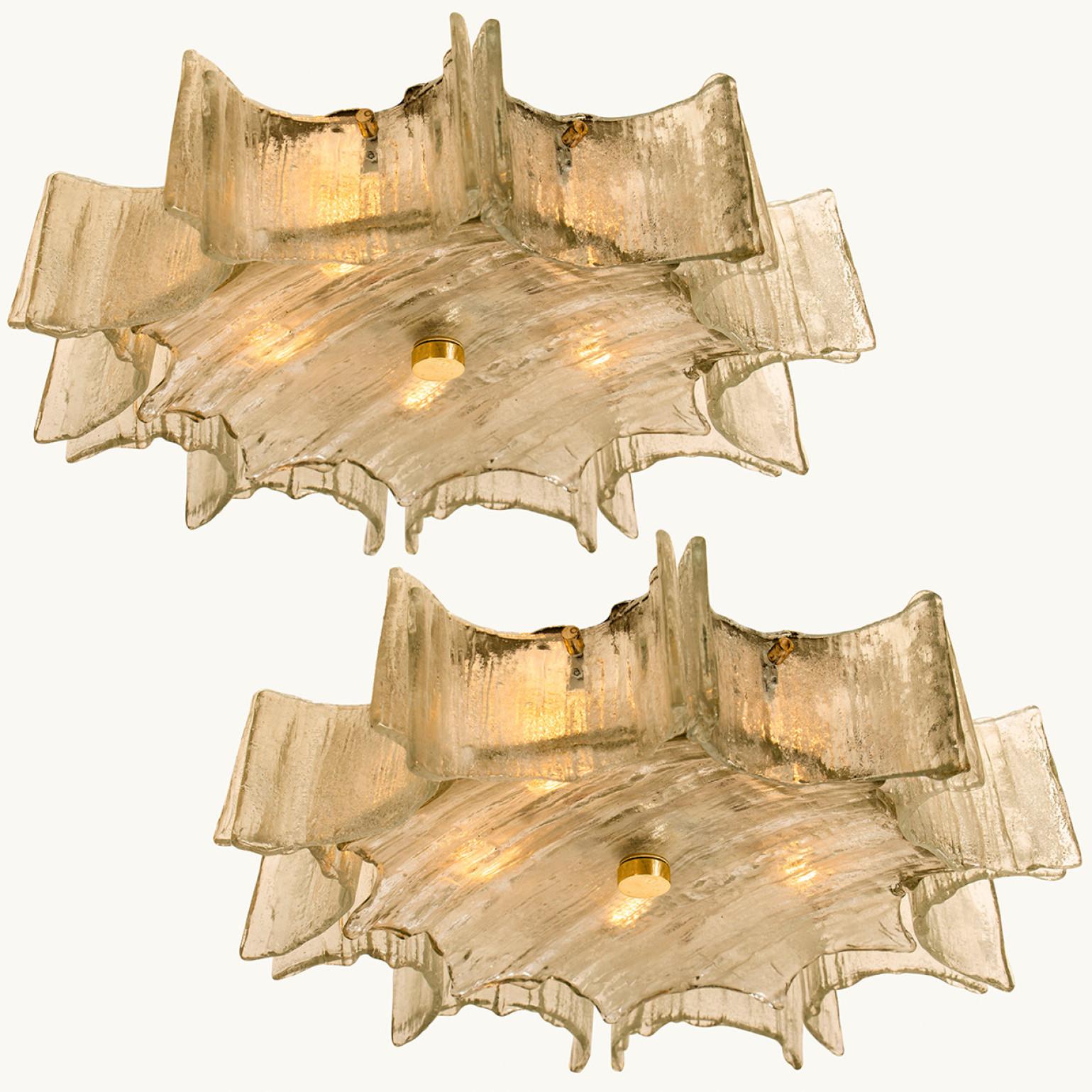 Stunning flush mount with textured glass and brass details. Minimalistic design executed with a taste for excellence in craftsmanship.
The textured glass creates beautiful variations and patterns in light and shadow.

The fixture requires 5 x E14