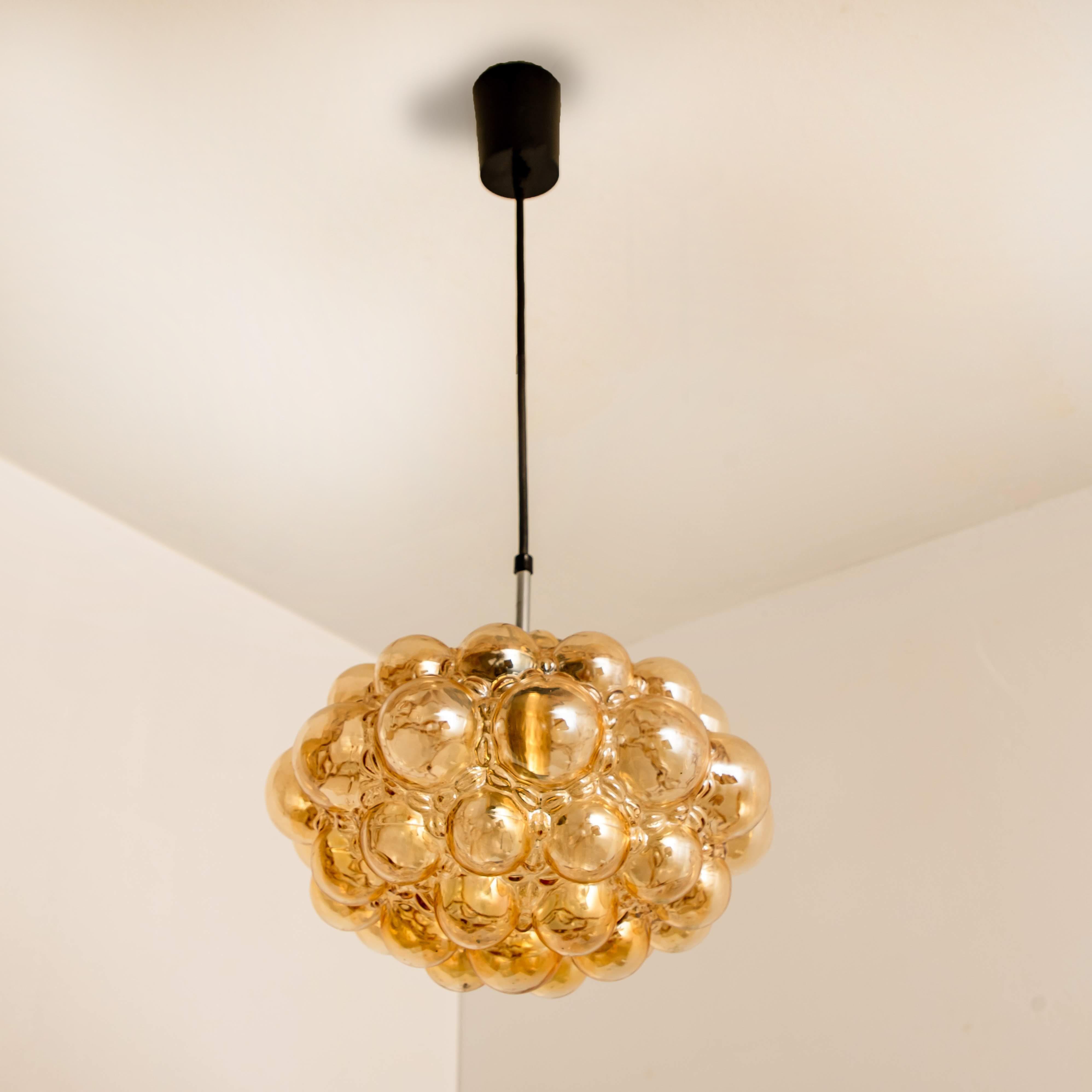 1 of the 3 Amber Bubble Glass Pendant Lamps by Helena Tynell, 1960 For Sale 4