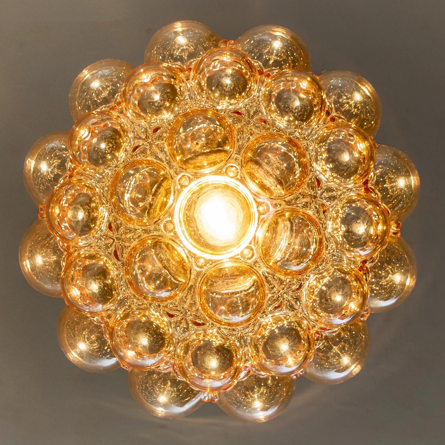 German 1 of the 3 Amber Bubble Glass Pendant Lamps by Helena Tynell, 1960