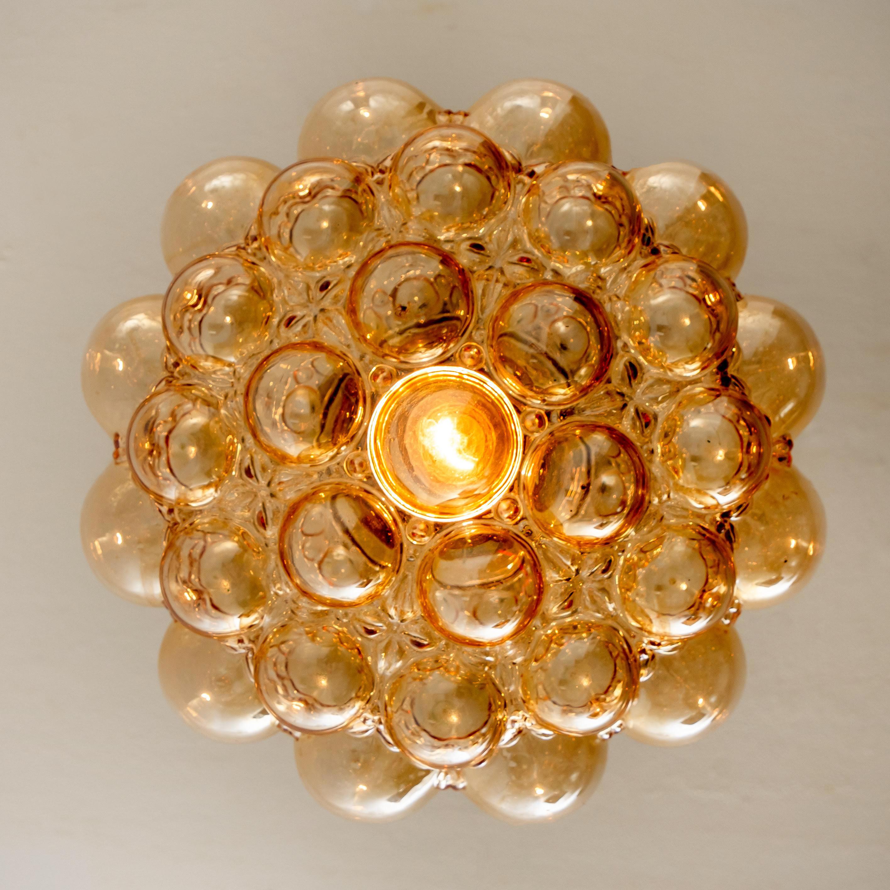 20th Century 1 of the 3 Amber Bubble Glass Pendant Lamps by Helena Tynell, 1960 For Sale