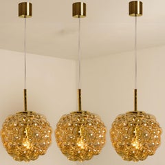 1 of the 3 Bubbled Glass and Brass Pendants by Helena Tynell, Germany 1970