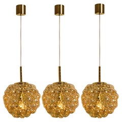 1 of the 3 Bubbled Glass and Brass Pendants by Helena Tynell, Germany 1970