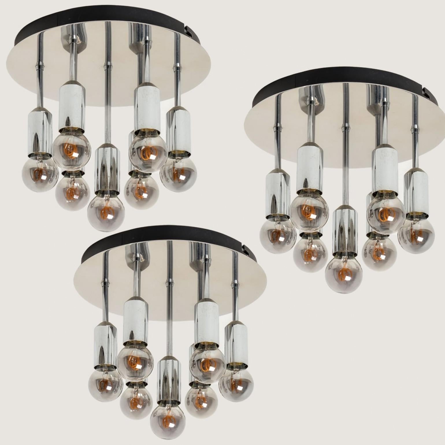 Beautiful chrome flush mounts by Cosack lights, Germany, 1960/1970.

Original 1960s space age chrome ceiling light with nine lighting elements. This light was designed and produced by Cosack Lights, one of the premium light producer is the 1960s and