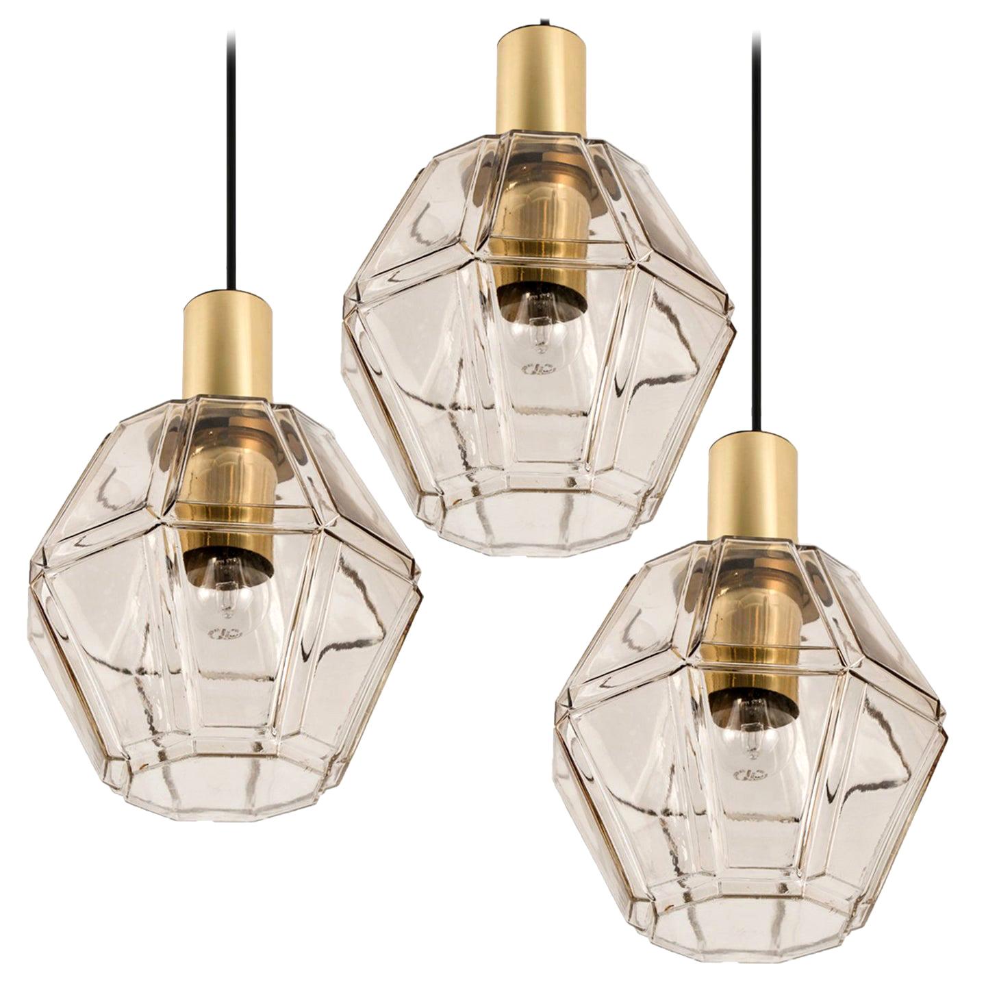 1 of the 3 Geometric Brass and Clear Glass Pendant Lights by Limburg, 1960