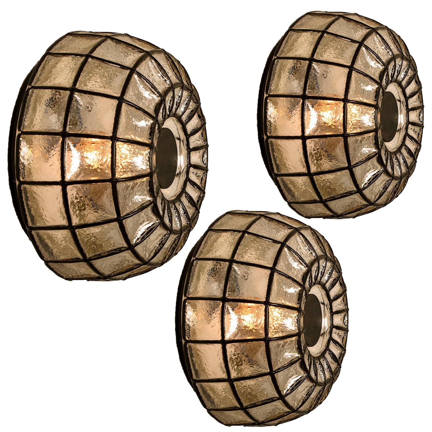 This beautiful and unique octagonal glass light flush mounts or wall lights/ sconces were manufactured by Glashütte Limburg in Germany during the 1960s (late 1960s or early 1970s). Nice craftsmanship. This Glass is blown and finished by hand. Each