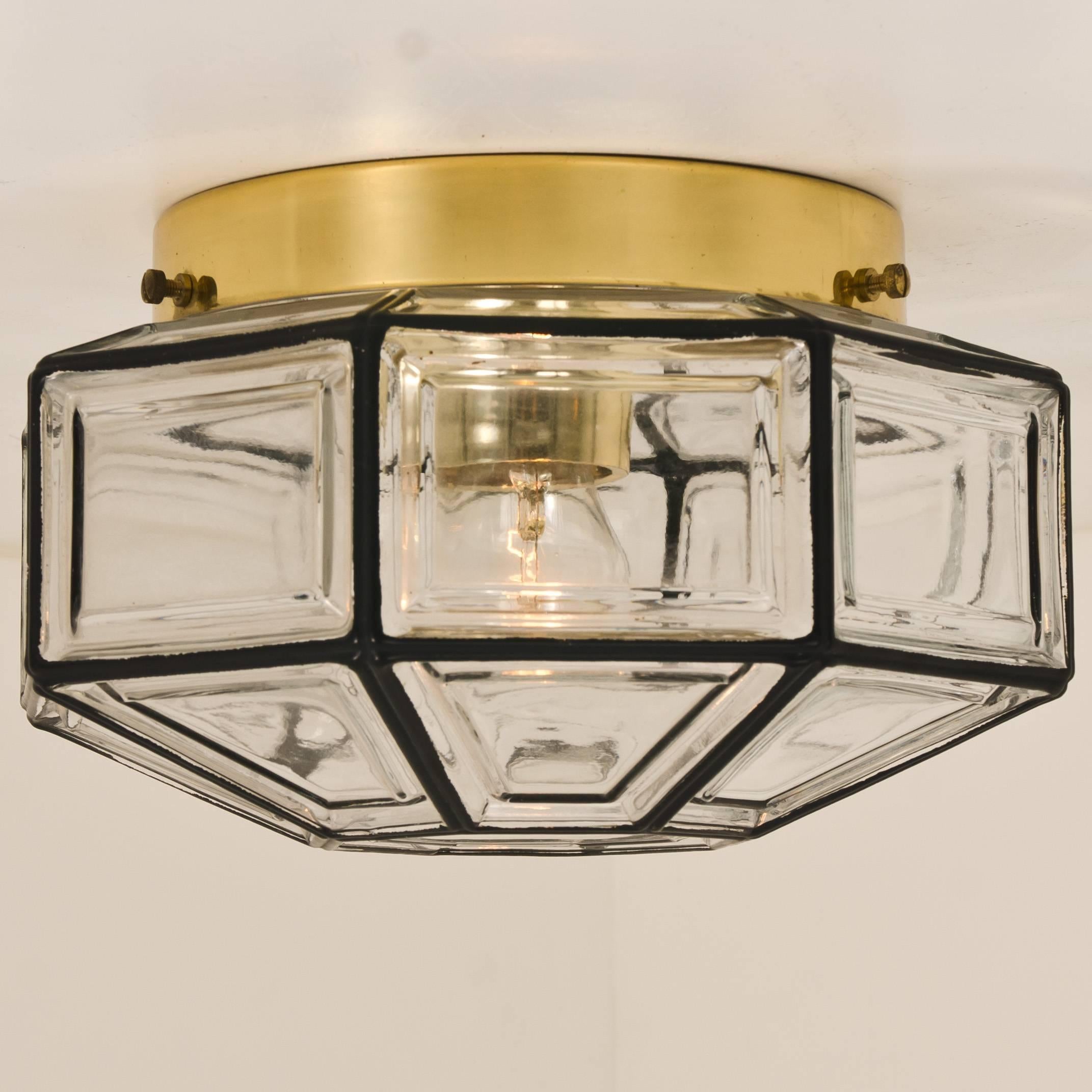 1 of the 3 beautiful set octagonal glass light flush mounts or wall lights were manufactured by Glashütte Limburg in Germany during the 1970s. Beautiful craftsmanship. Illumintates beautifully.


Please note the price is for one piece. 
In good