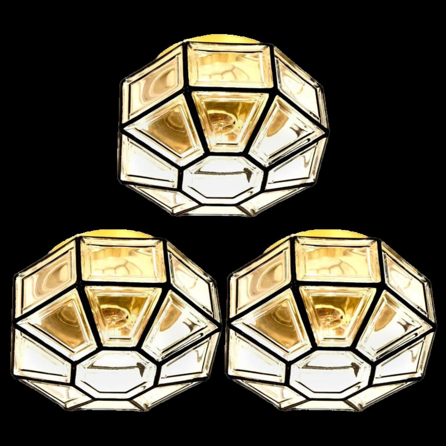 One of the three beautiful set octagonal glass light flush mounts or wall lights were manufactured by Glashütte Limburg in Germany during the 1970s. Beautiful craftsmanship. Illuminates beautifully.

Please note the price is for one-piece. Three