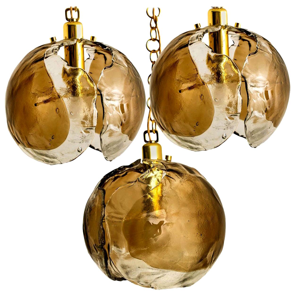 1 of the 3 Kalmar Chandelier Pendant Lights, Smoked Glass and Brass, 1970s