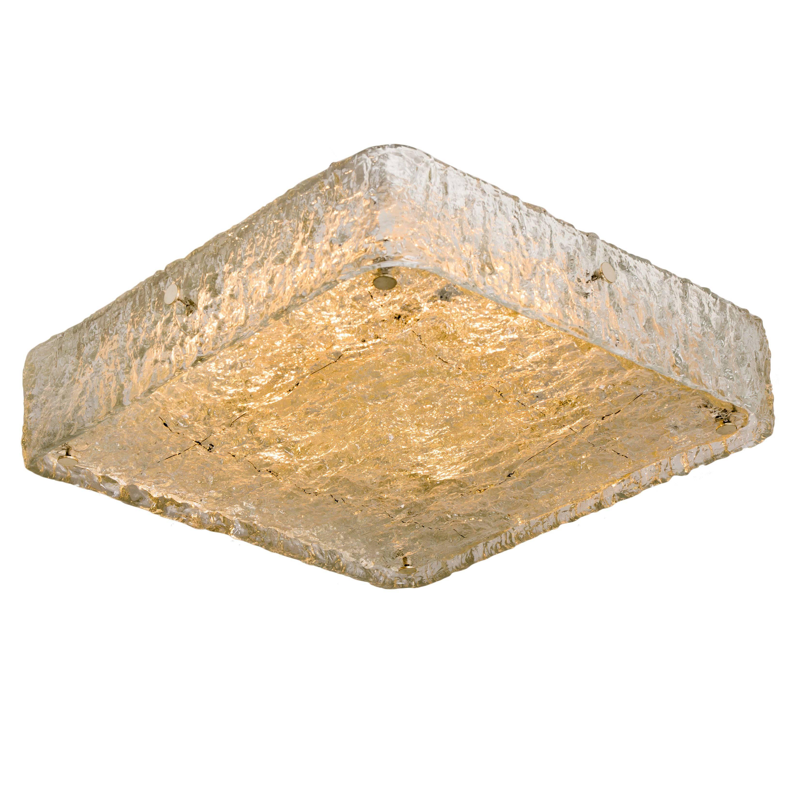 1 of the 3 handmade high quality light fixture made by J.T. Kalmar, Austria, manufactured in midcentury, circa 1970 (at the end of 1960s and beginning of 1970s).

This flushmount or ceiling light features four sheets made of handmade, think