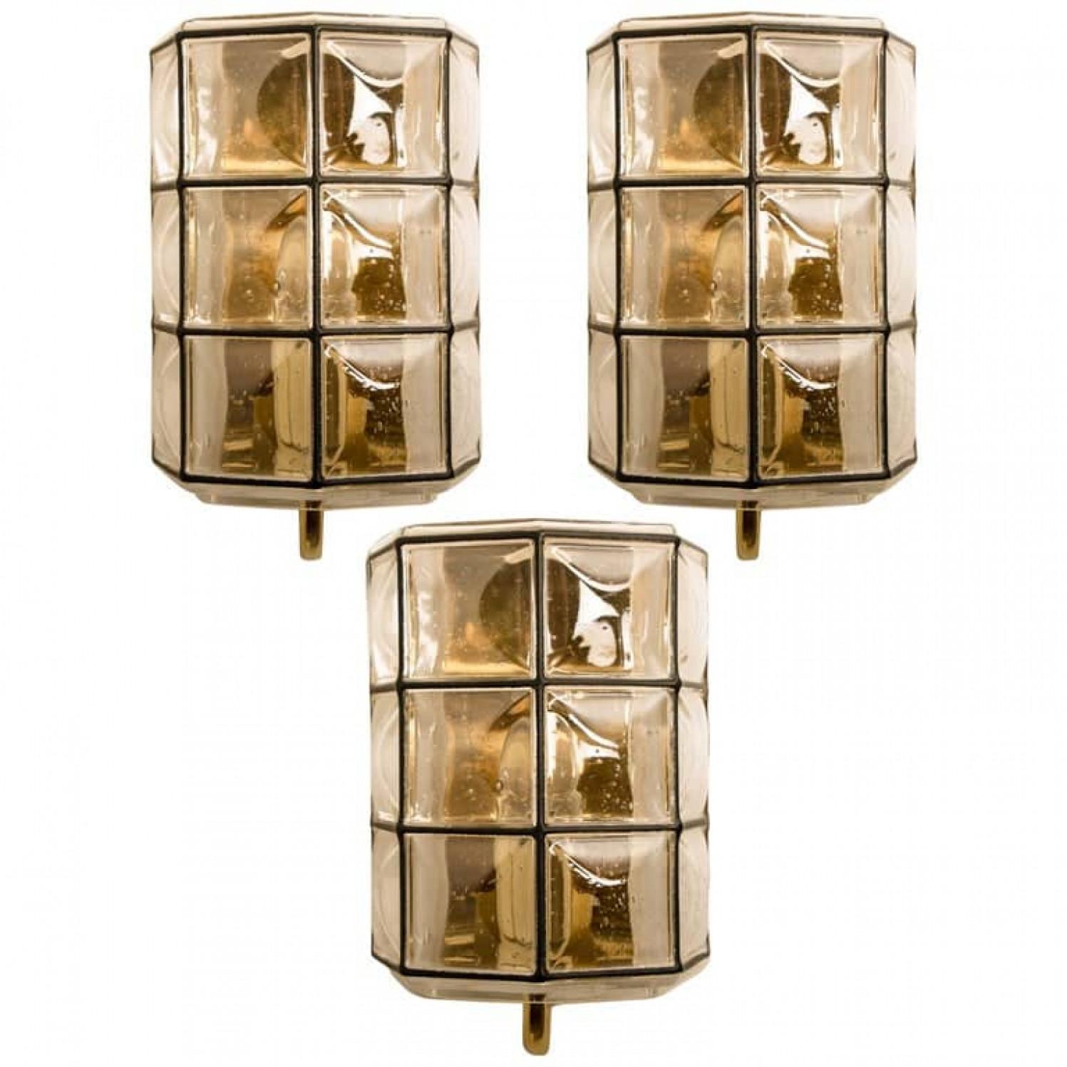 1 of the 3 beautiful and unique hand blown glass wall lights. Manufactured by Glashütte Limburg in Germany during the 1960s, (late 1960s or early 1970s).

Beautiful craftsmanship. Elaborate clear bubble glass which bulges slightly out of its black